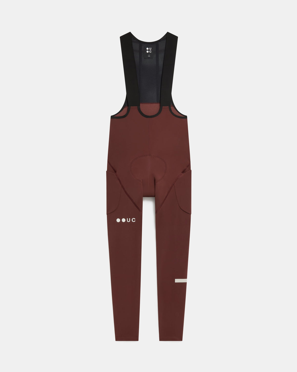 Flatlay of the Men's Mono Cargo Bib Tight in Deep Red: mesh upper bib, side thigh cargo pockets and UC leg logo.