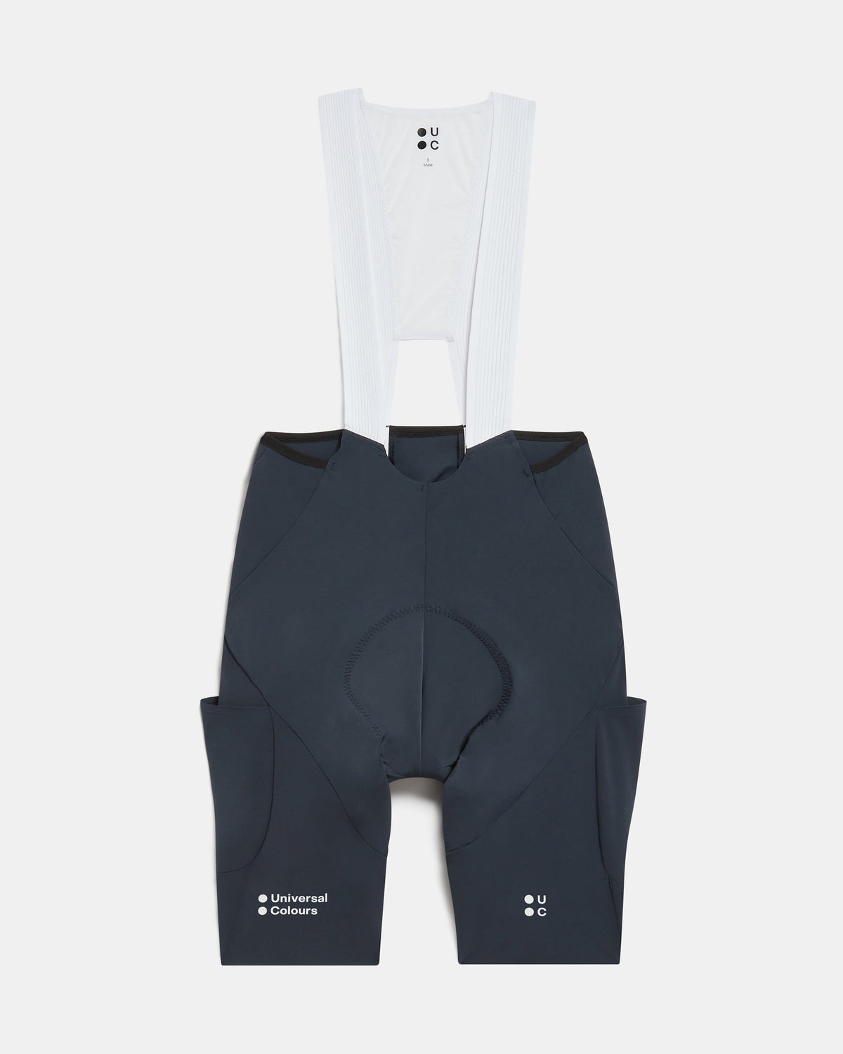 Flatlay of the Men's Chroma Cargo Bib Shorts in Navy Blue: ribbed bib straps, a pocket on each thigh and Universal Colours leg logos.