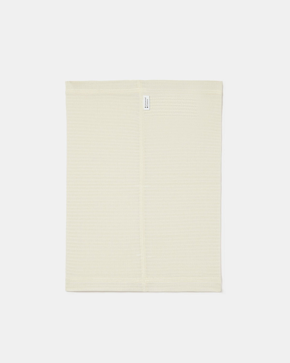Flatlay of the Polartec Neck Warmer in Off White.