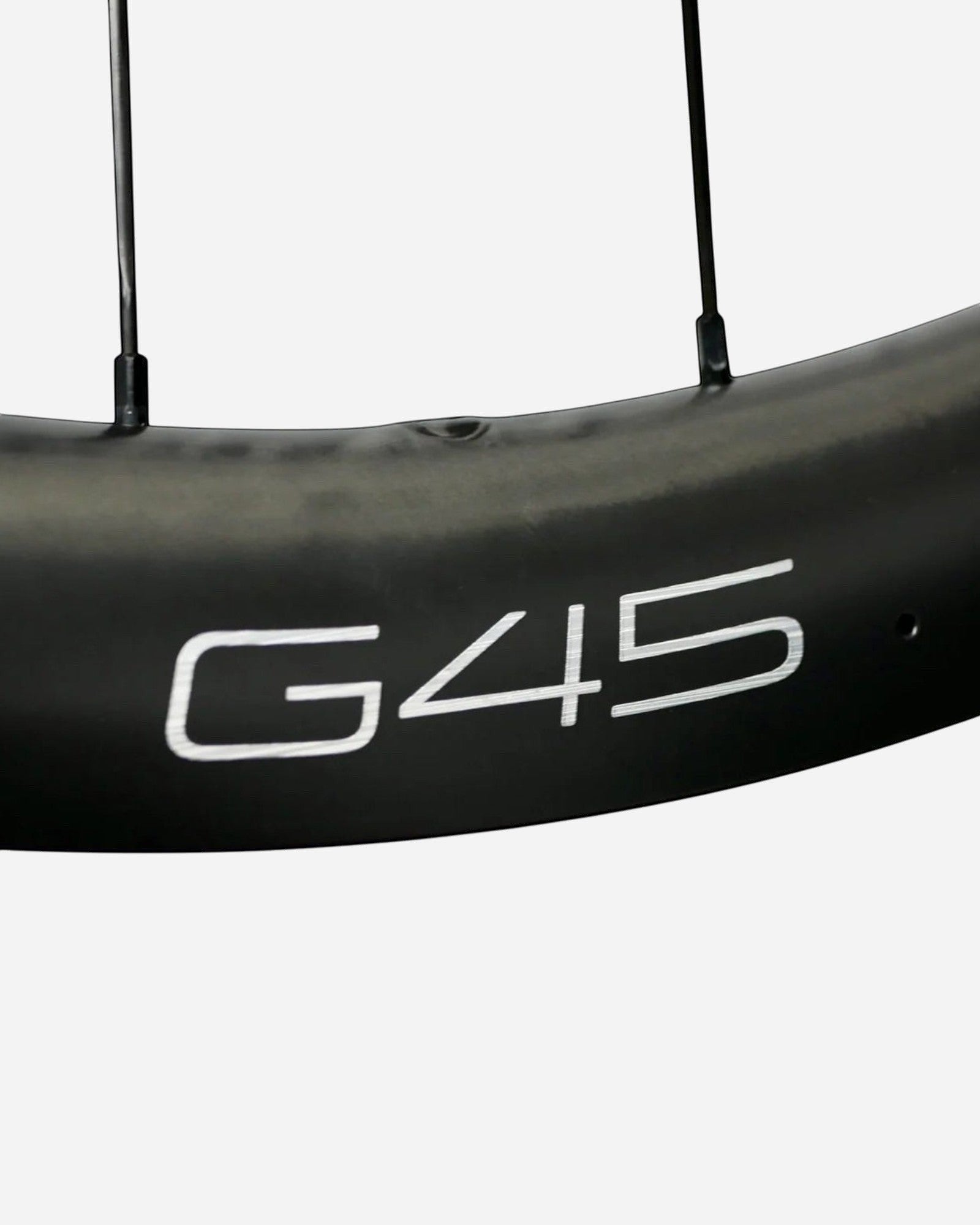 Moloko Cycling Ltd. G45 disc brake wheelset, 45mm deep carbon rim with Sapim CX-Ray spokes and Creative hubs.