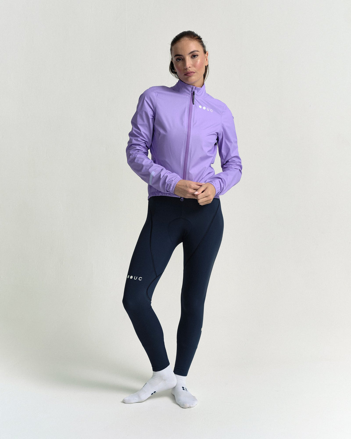 Model standing in the Women's Mono Rain Jacket in Cloud Lilac, front view.