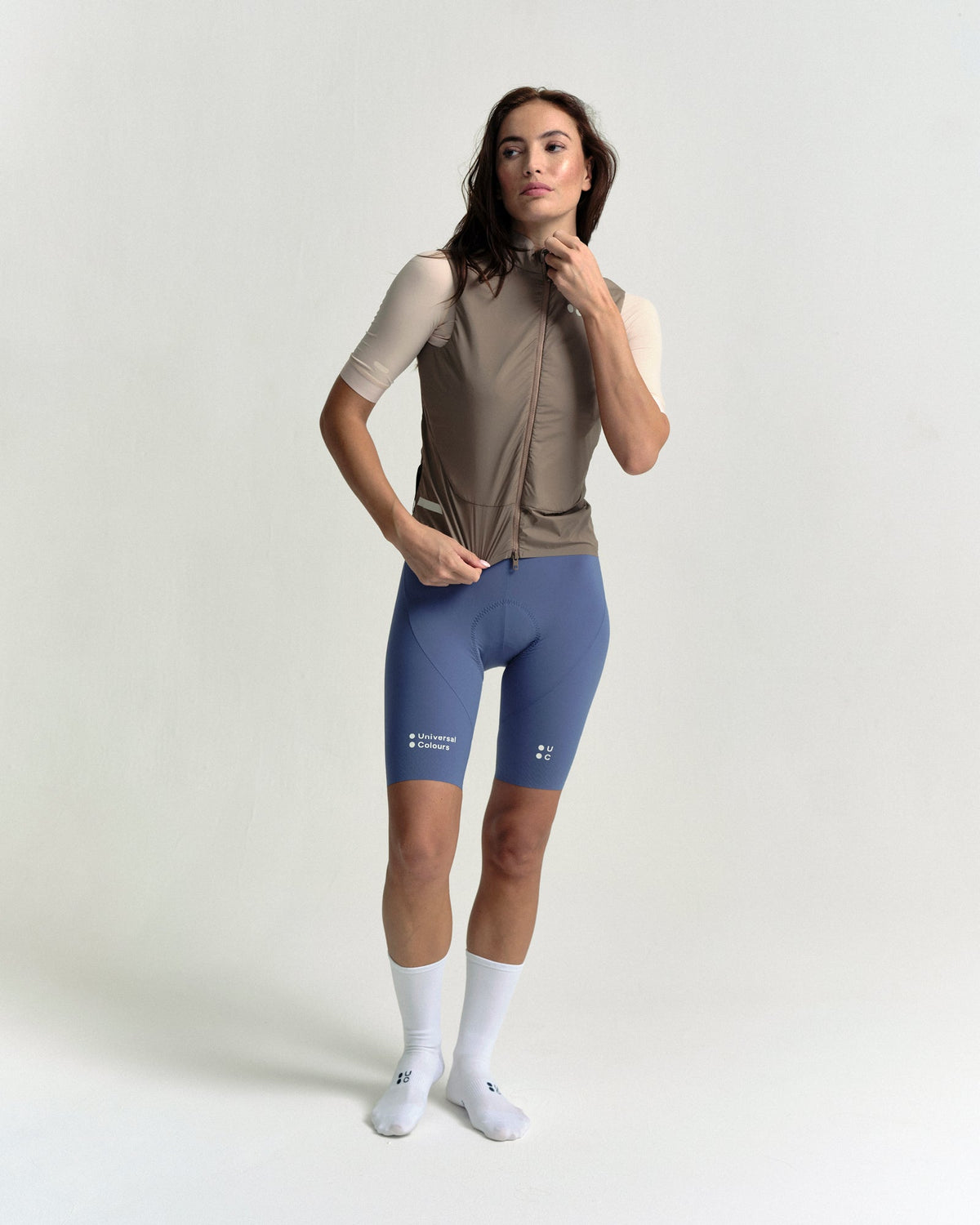 Model in the Women's Chroma Insulated Gilet in Walnut Brown, full-length view.