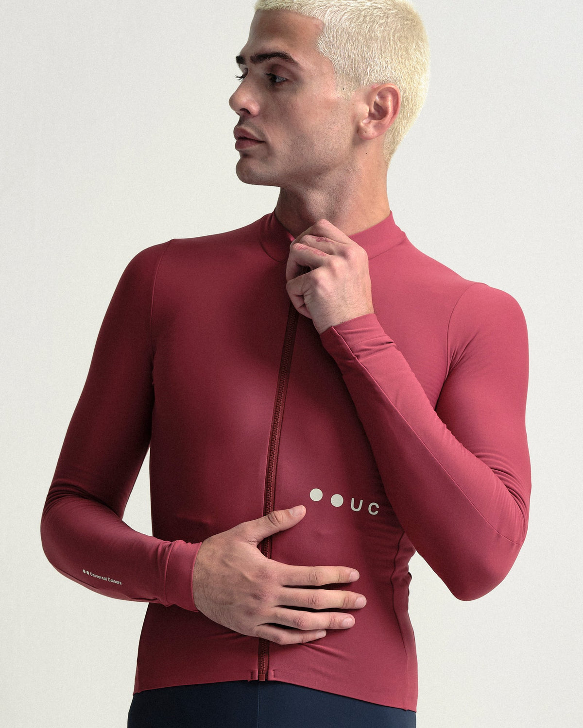 Close view of the Men's Mono Long Sleeve Jersey in Apple Red and its chest logo.