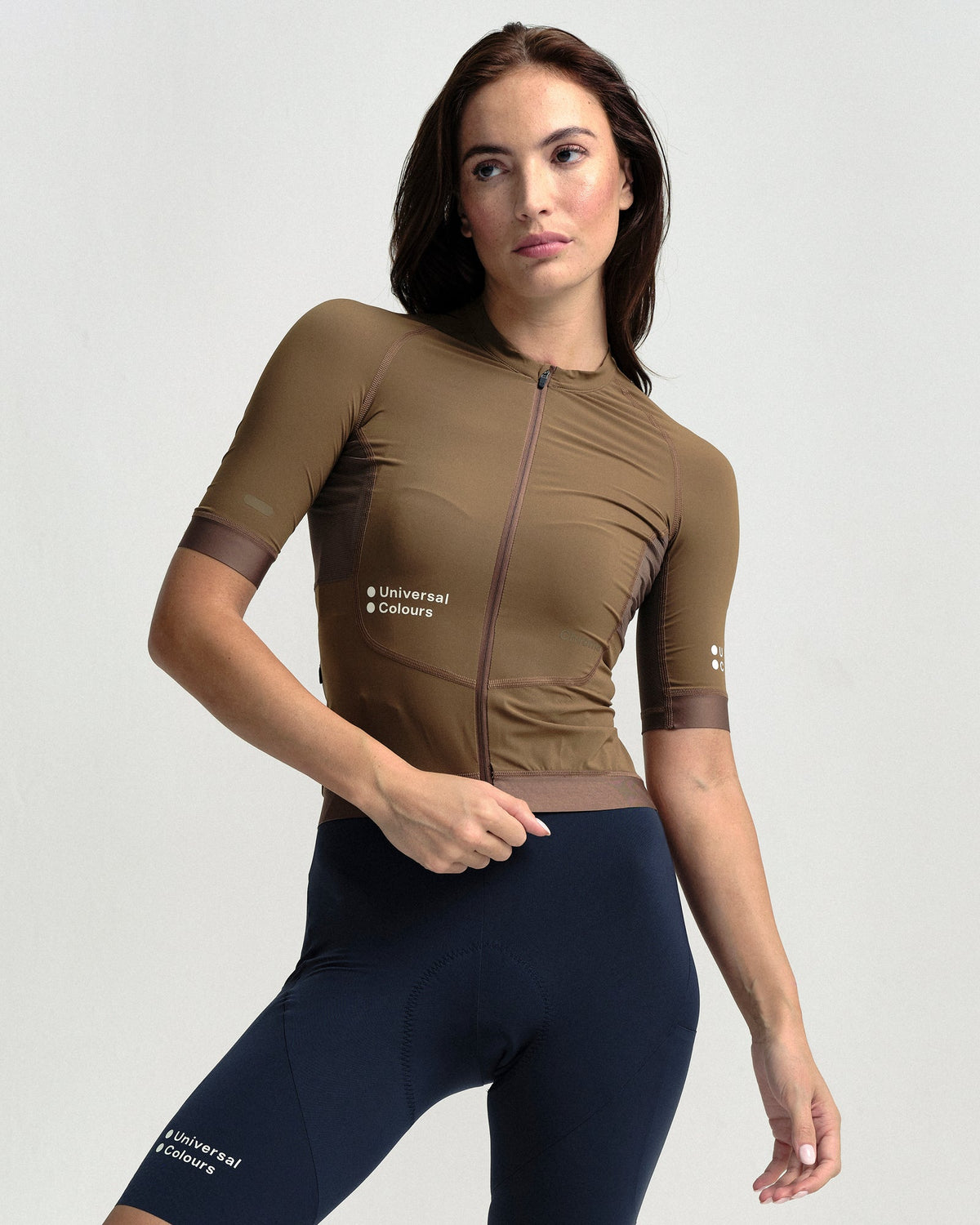 Model wearing the Women's Chroma Short Sleeve Jersey in Golden Brown.