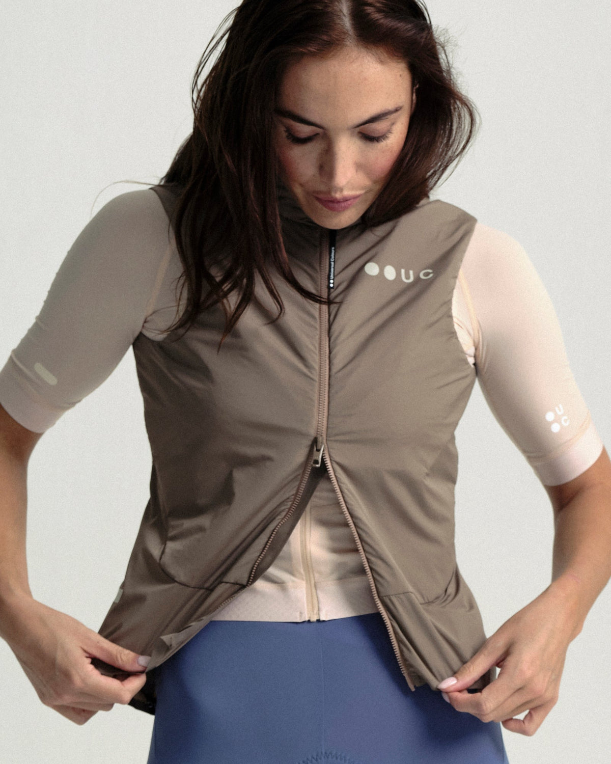 Model wearing the Women's Chroma Insulated Gilet in Walnut Brown.