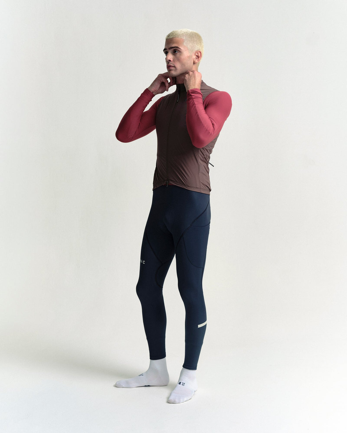 Model wearing the Men's Spectrum Gilet 2.0 in Honey Gold.