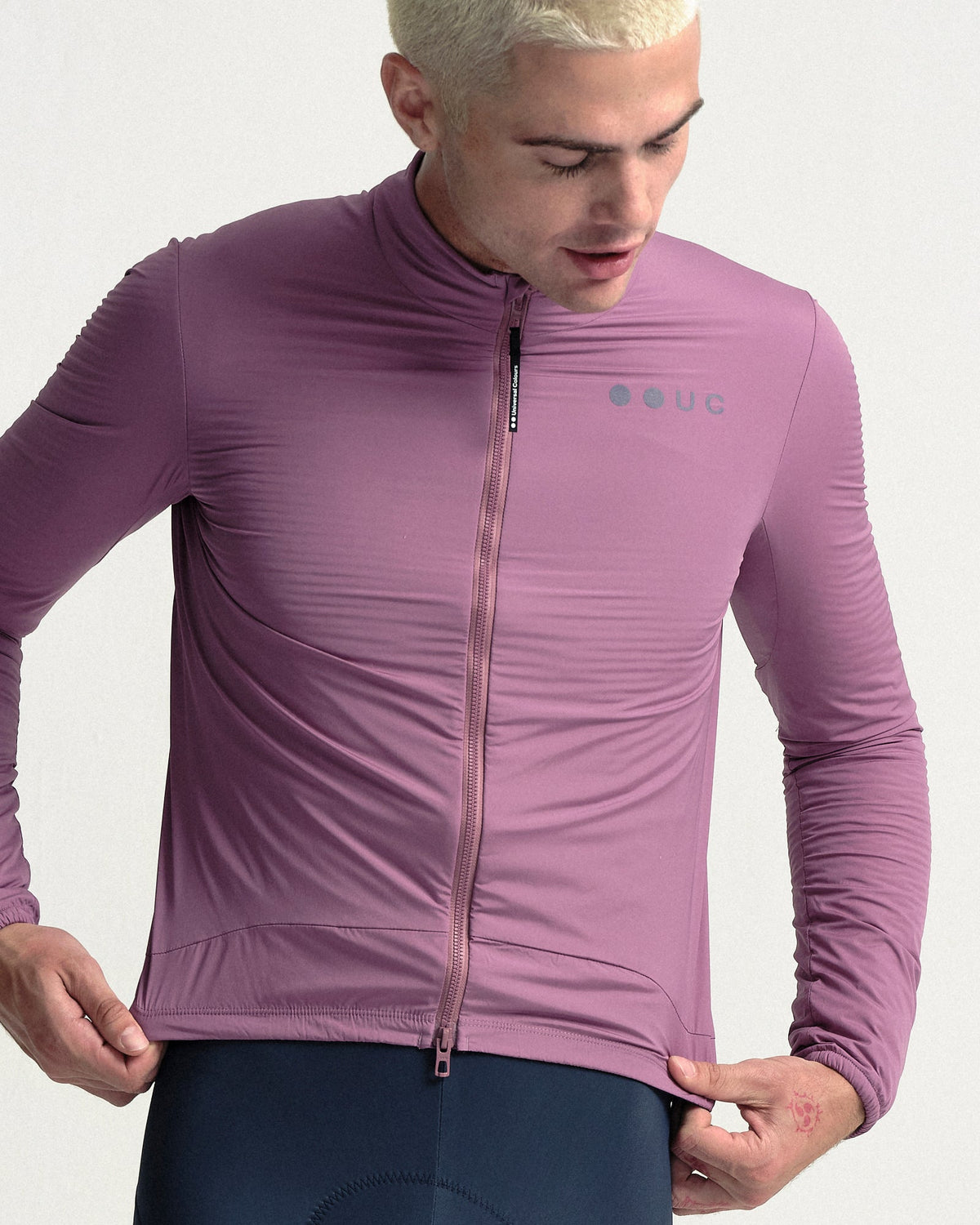 Model wearing the Men's Mono Insulated Jacket in Dusty Rose.