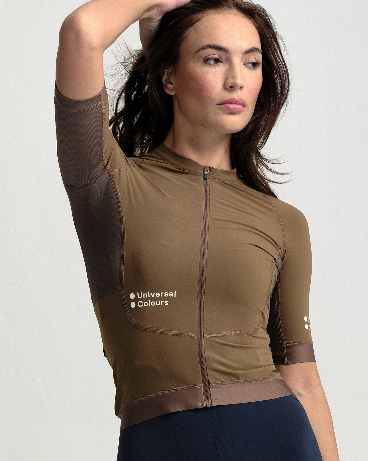 Model wearing the Women's Chroma Short Sleeve Jersey in Golden Brown.
