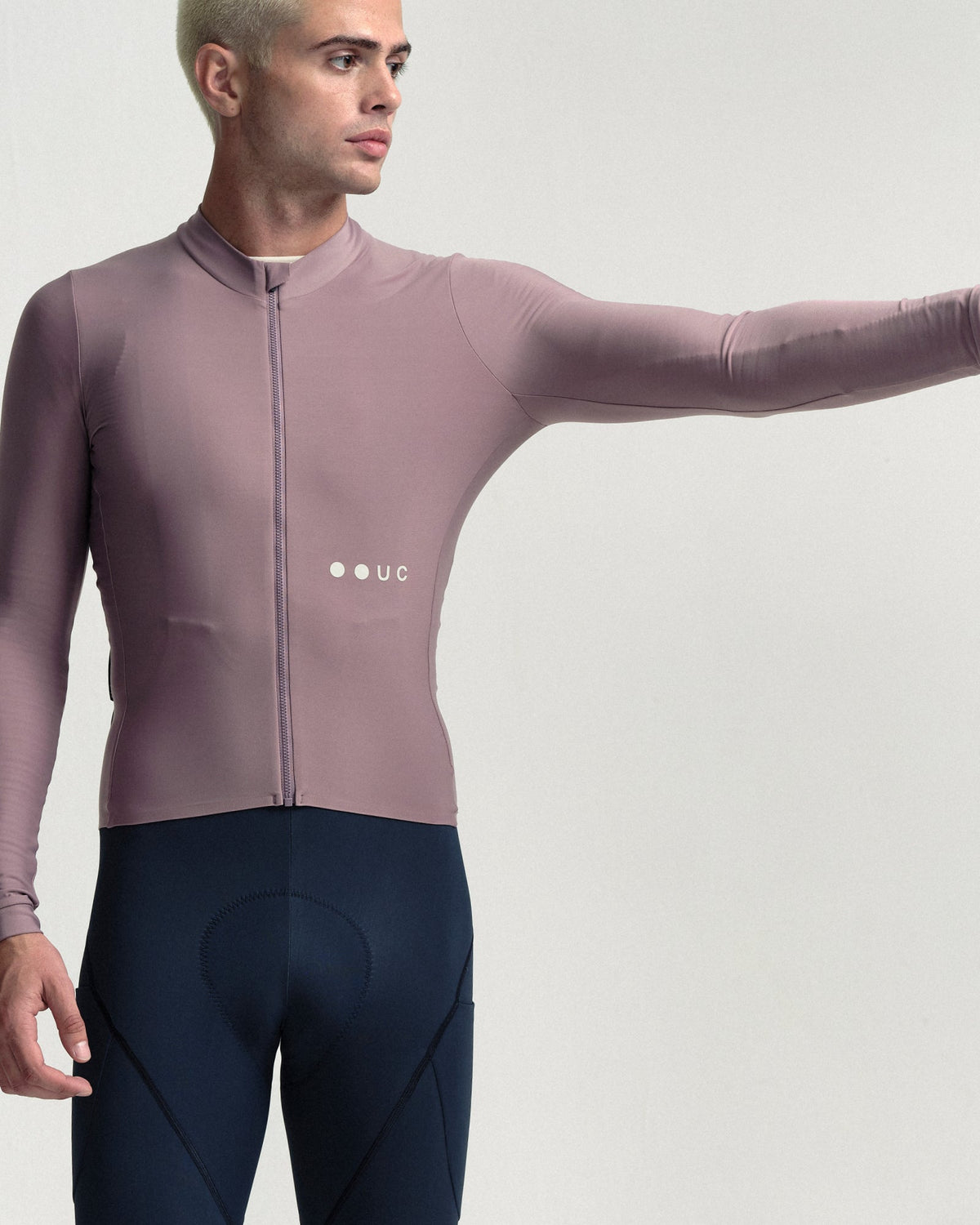 Model wearing the Men's Mono Long Sleeve Jersey in Mauve Mist.
