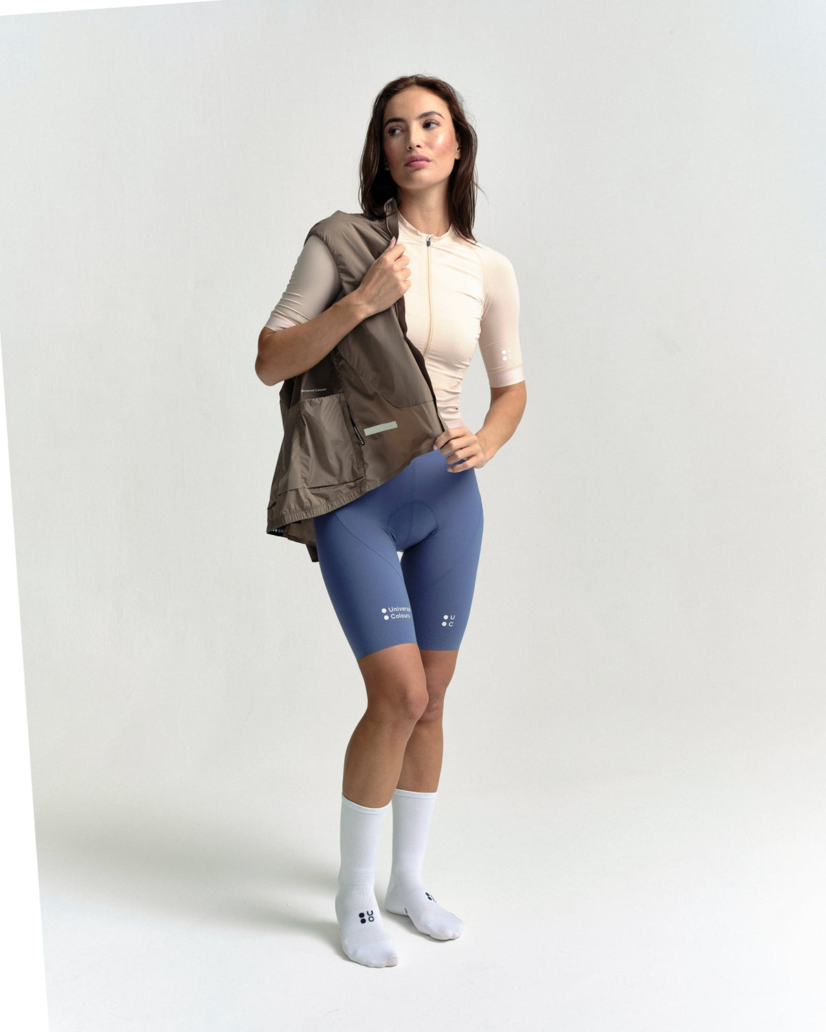 Model wearing the Women's Chroma Insulated Gilet in Walnut Brown.