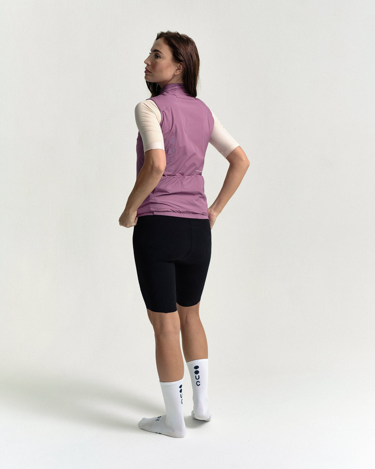 Model wearing the Women's Chroma Insulated Gilet in Dusty Rose.