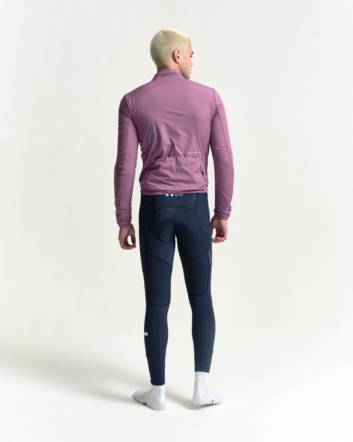 Model wearing the Men's Mono Insulated Jacket in Dusty Rose.