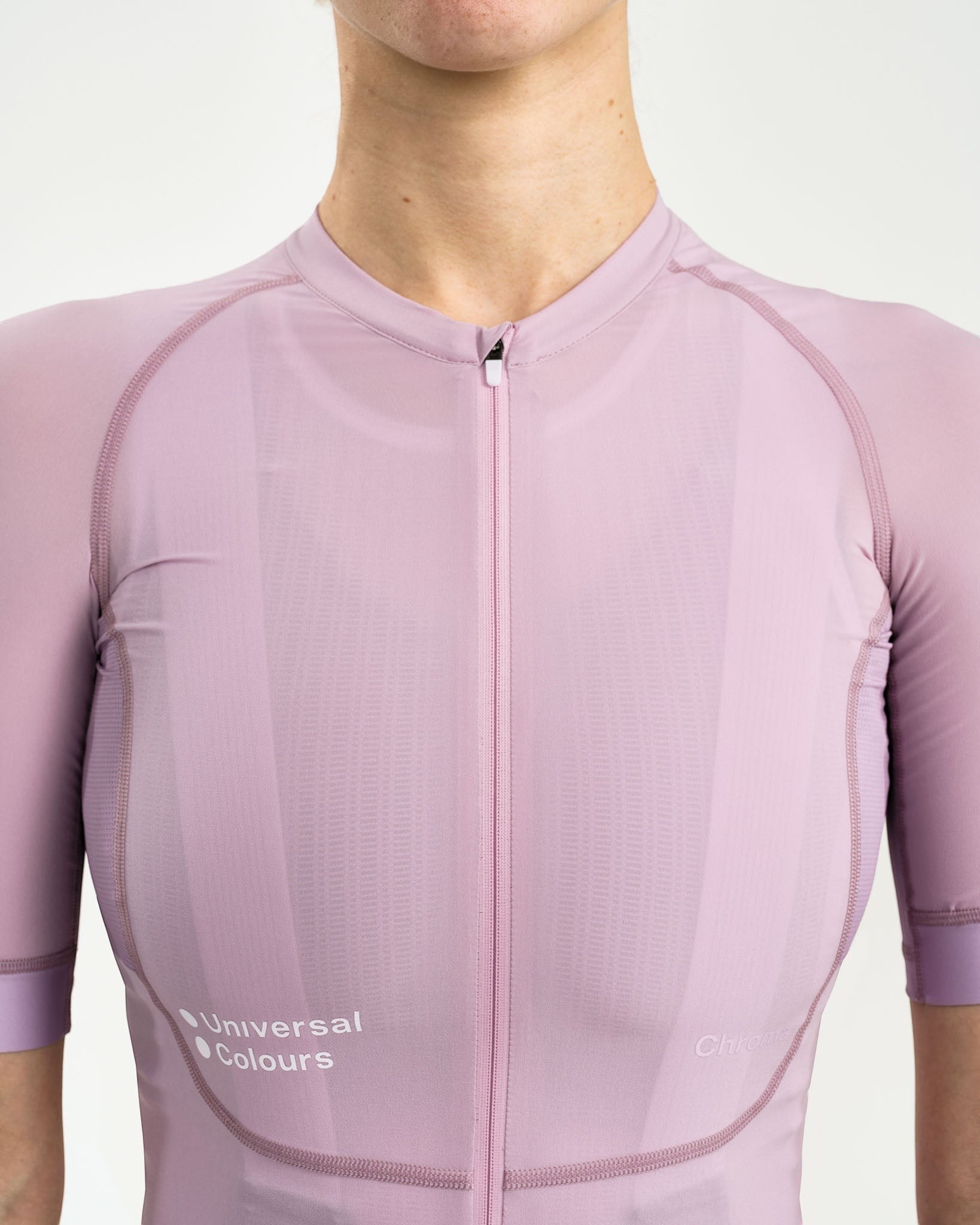 Moloko Cycling Ltd. women's short sleeve cycling jersey in washed lilac, made from recycled polyester and Italian woven fabric with a matte finish and three rear pockets.