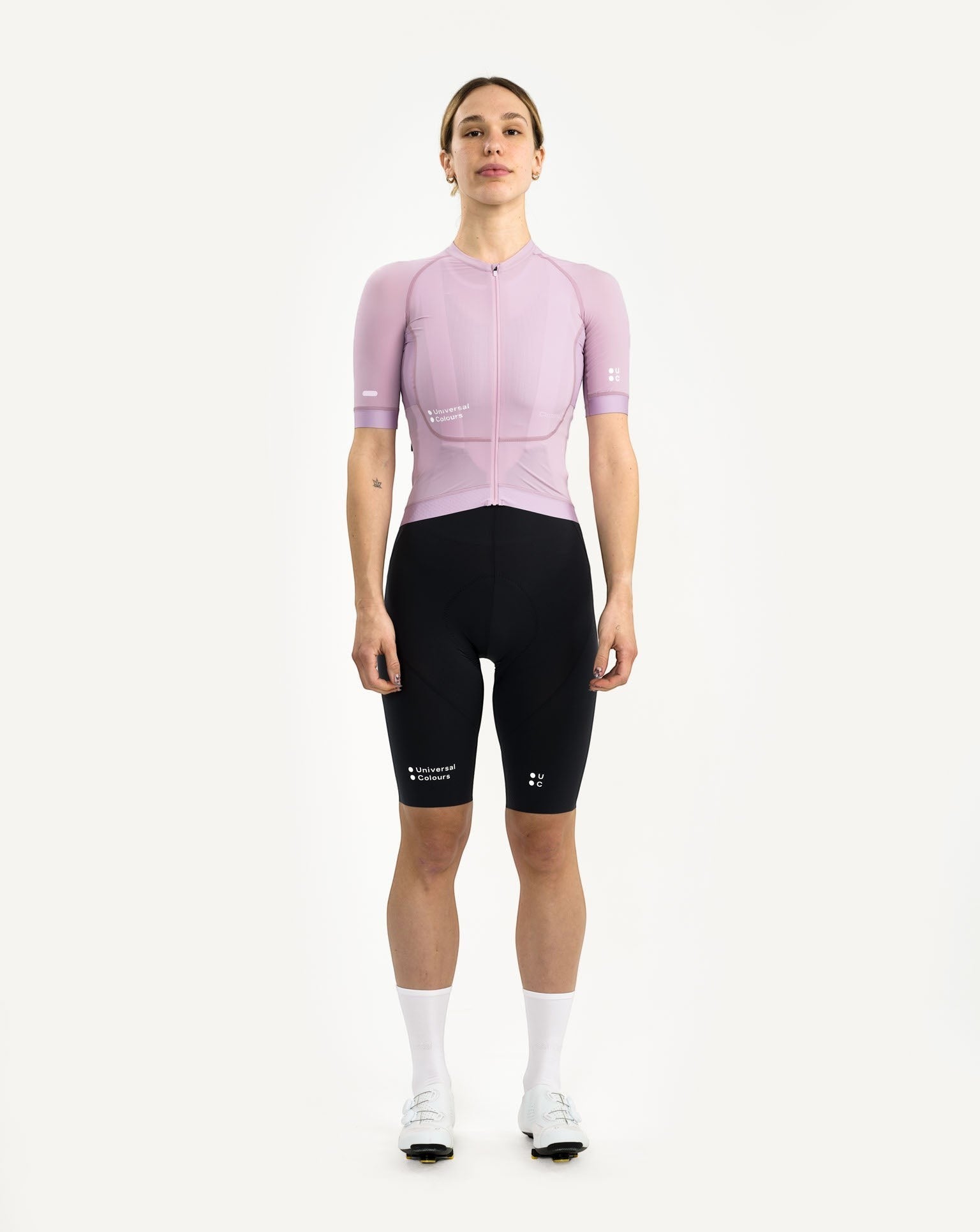 Moloko Cycling Ltd. women's short sleeve cycling jersey in washed lilac, made from recycled polyester and Italian woven fabric, featuring a tailored fit and three rear pockets.