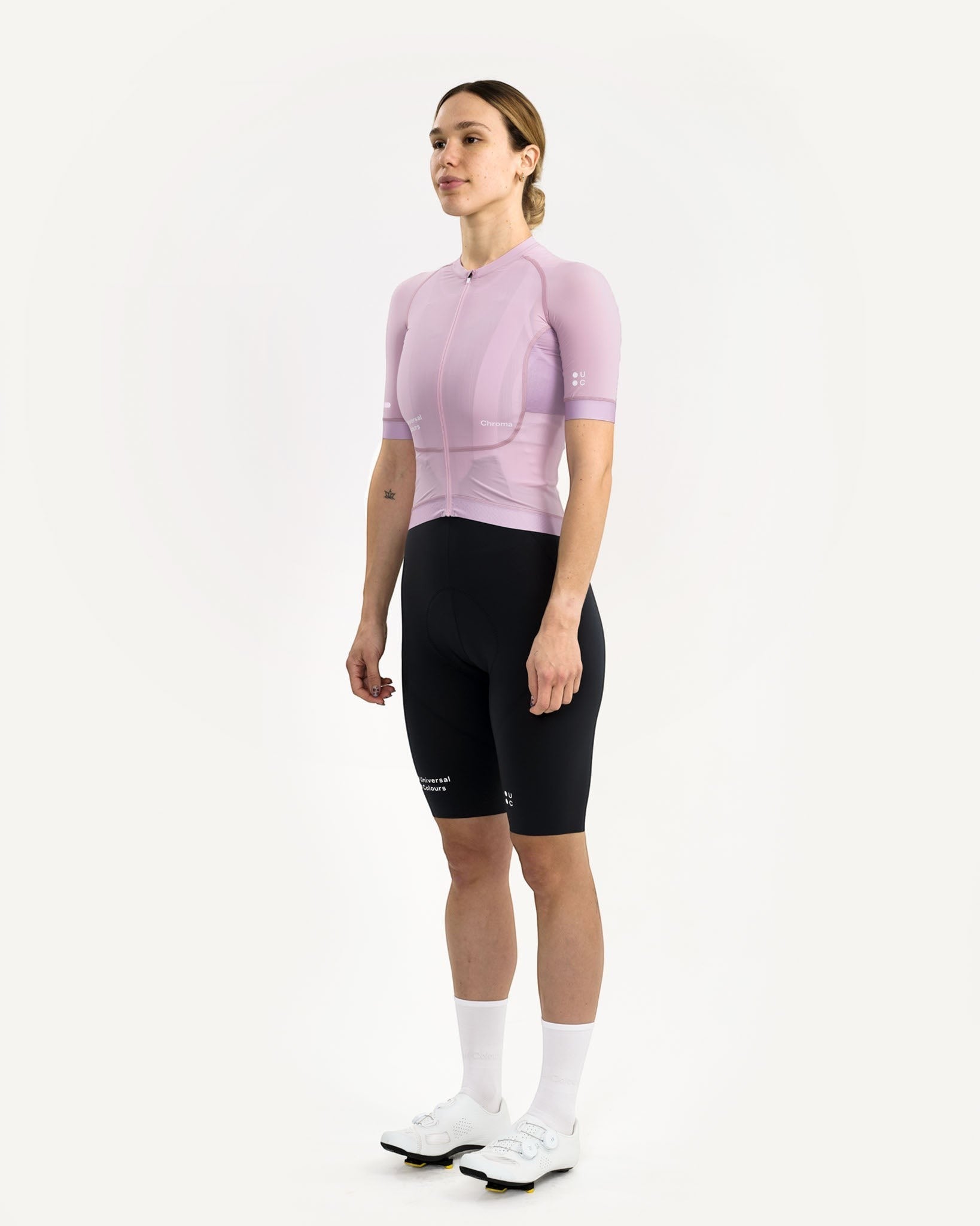 Moloko Cycling Ltd. women's short sleeve cycling jersey in washed lilac, made from recycled polyester and Italian woven fabric with a tailored fit and three rear pockets.
