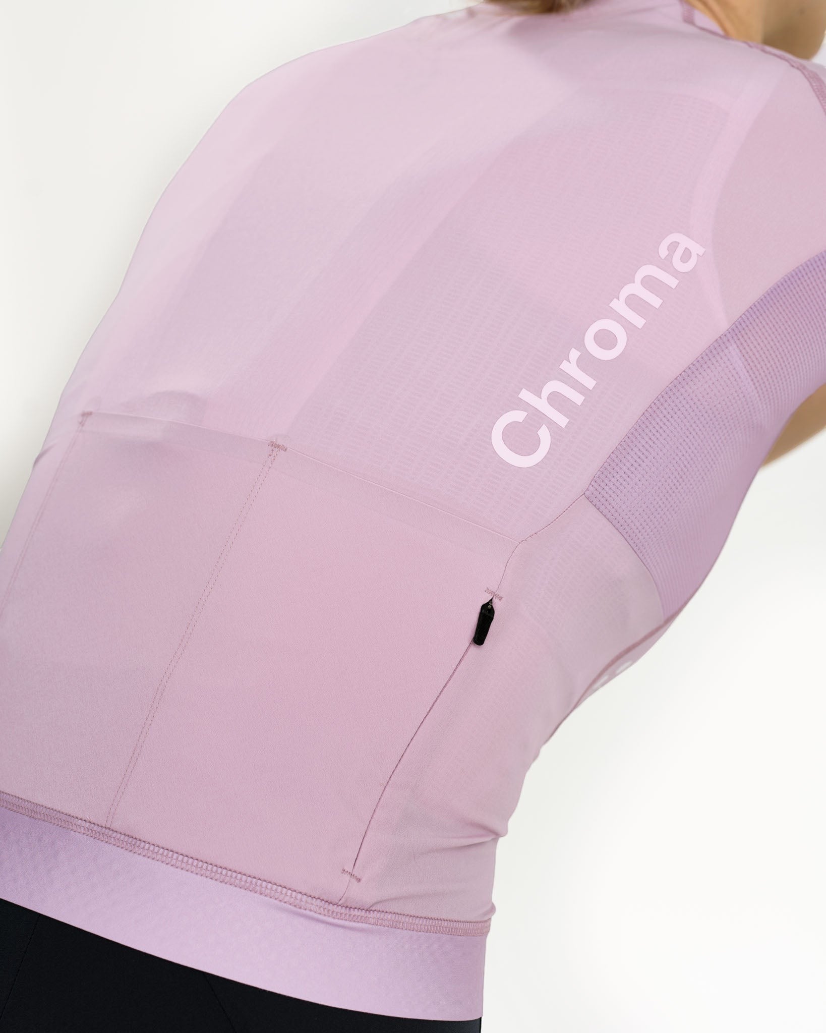Moloko Cycling Ltd. women's short sleeve cycling jersey in washed lilac. Made from recycled polyester with three rear pockets and a full-length zip.