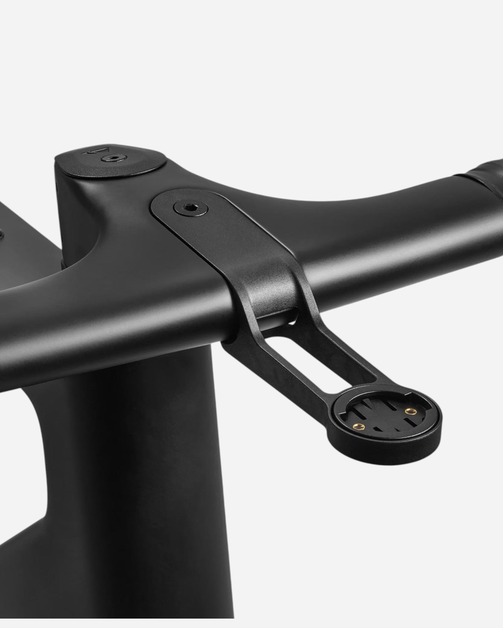 Moloko Cycling Ltd. black carbon fiber bike computer mount attached to handlebars.