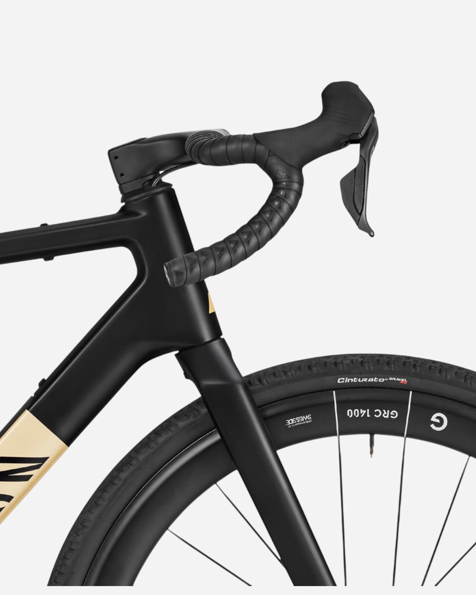 Moloko Cycling Ltd. black carbon gravel bike with tan accents, drop handlebars, and SRAM AXS electronic shifting.