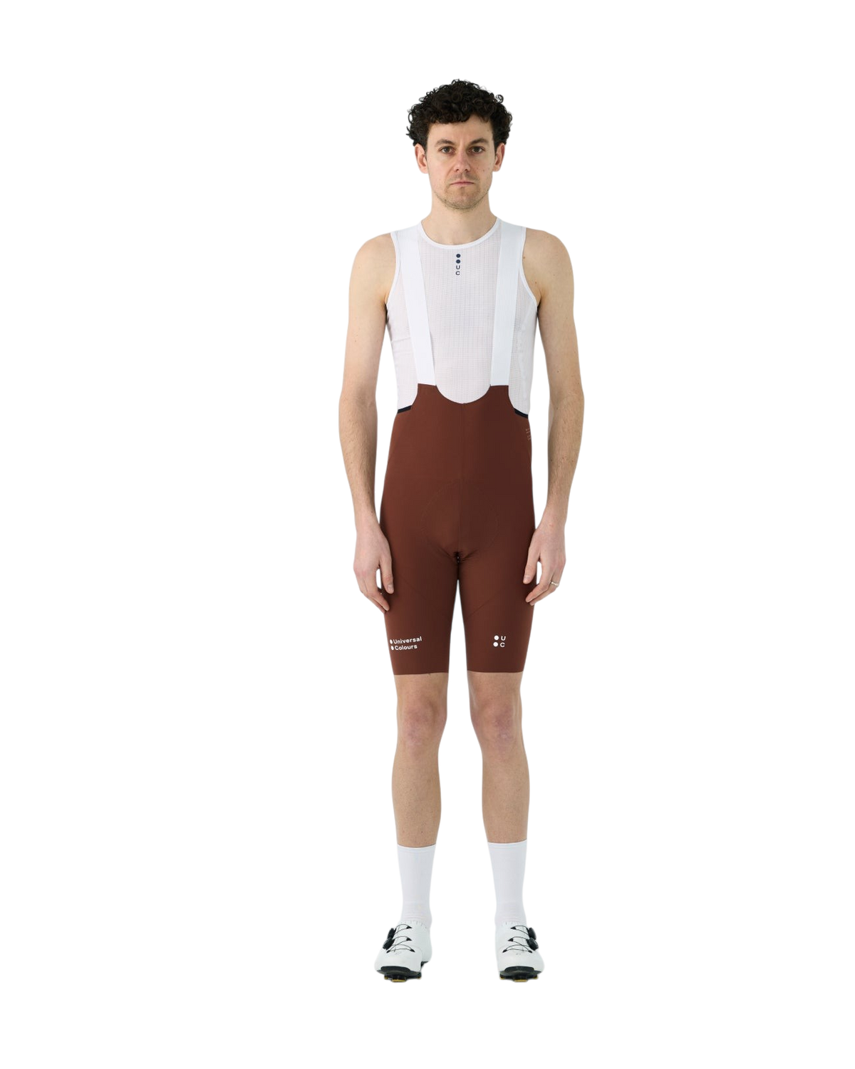 Moloko Cycling Ltd. men's brick red Chroma bib shorts with white mesh straps and performance chamois pad