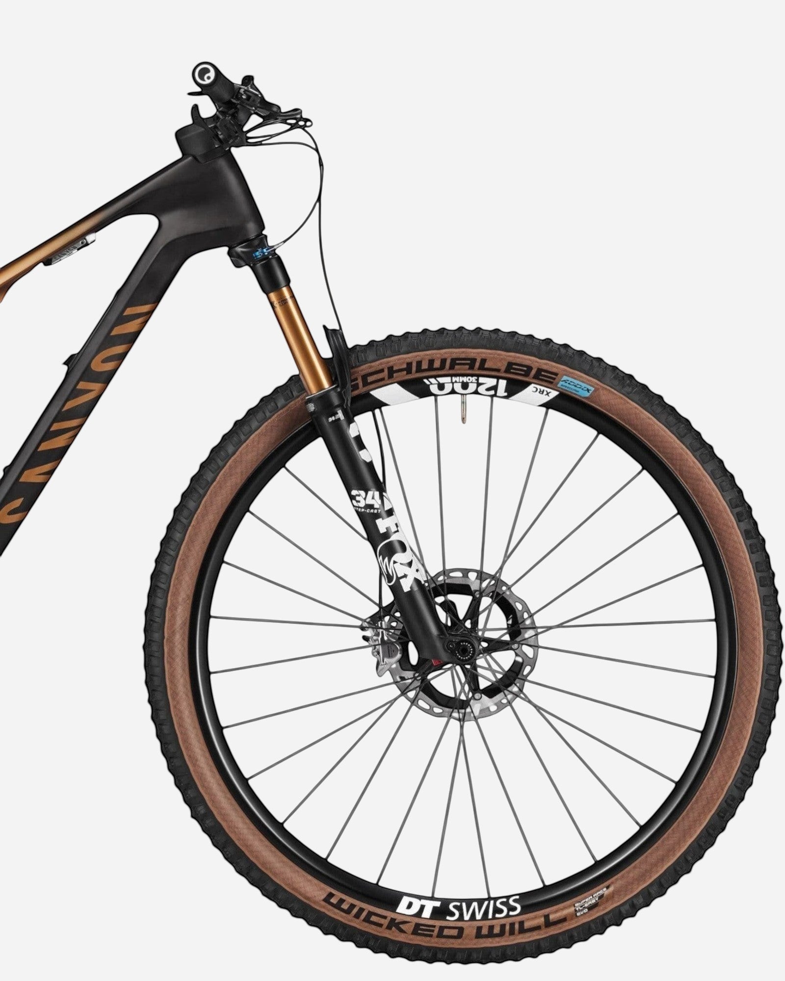 Moloko Cycling Ltd. Ex-Demo Lux Trail CFR 2024 mountain bike, size M, with black and gold frame, Fox 34 suspension fork, and Schwalbe Wicked Will tires.