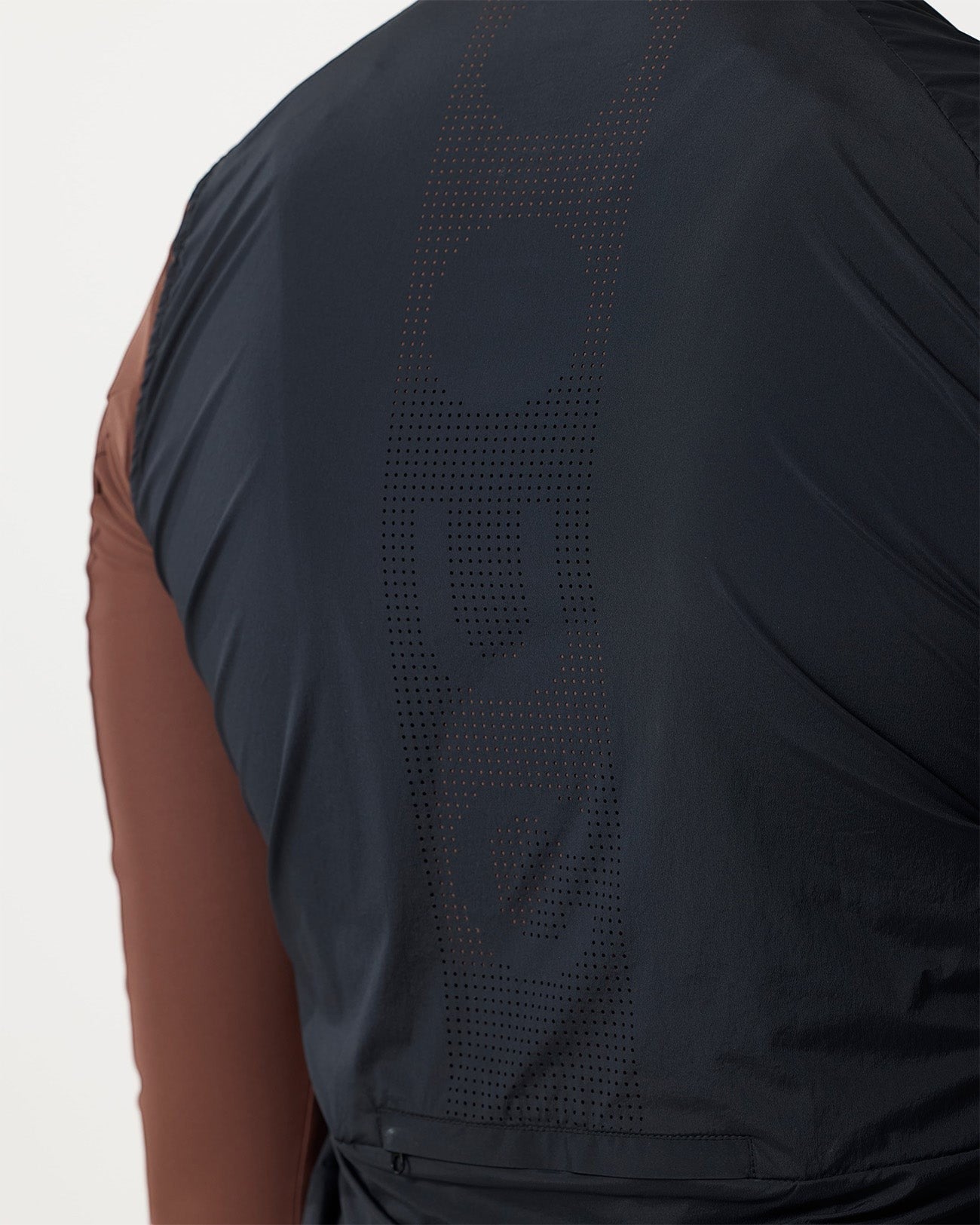 Moloko Cycling Ltd. Men's Bamboo Black windproof gilet with reflective detailing and perforated back panel.