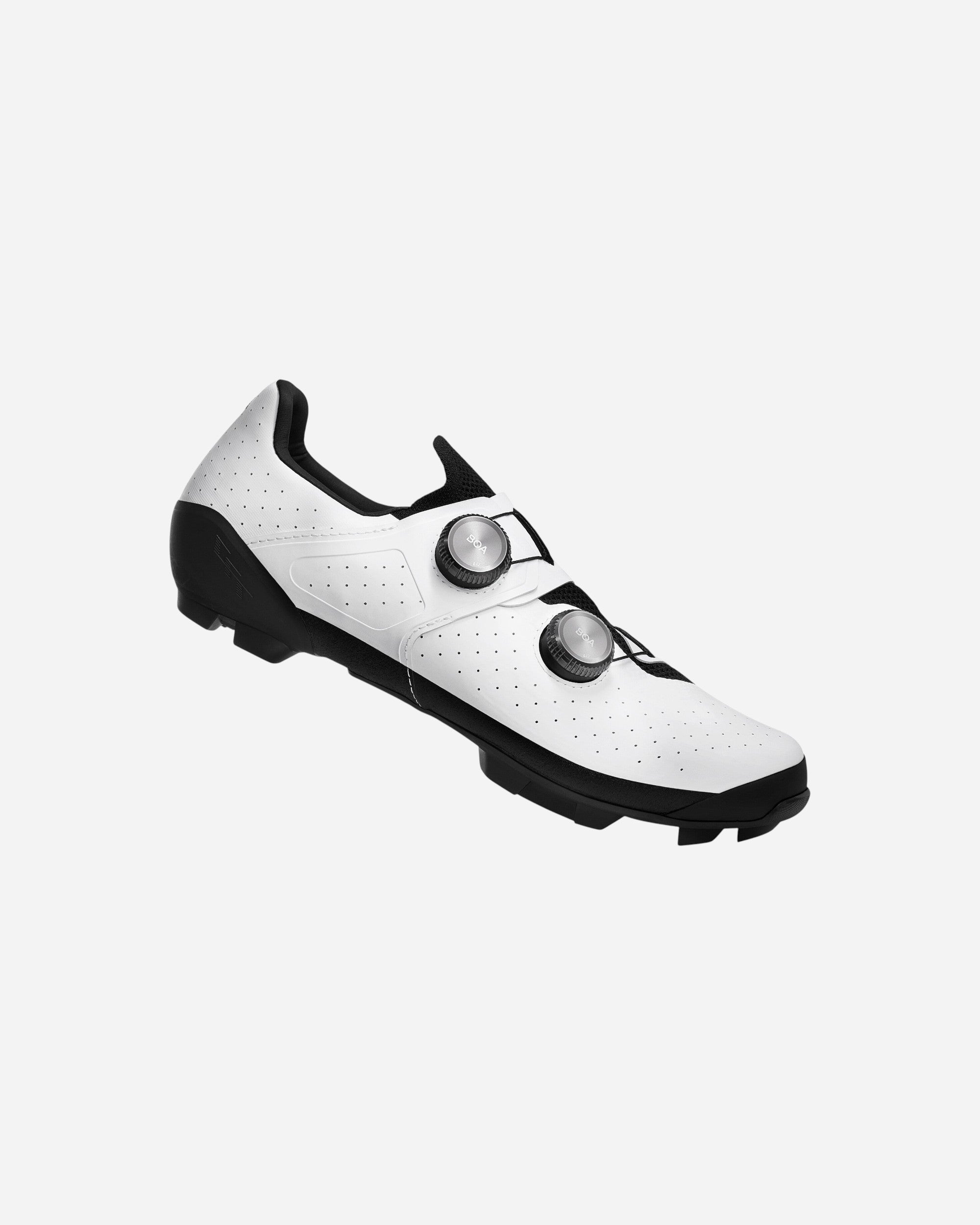 Moloko Cycling Ltd. Tempr CFR Off-Road Shoes: white cycling shoes with black accents, dual BOA dials, and Vibram Megagrip outsole.