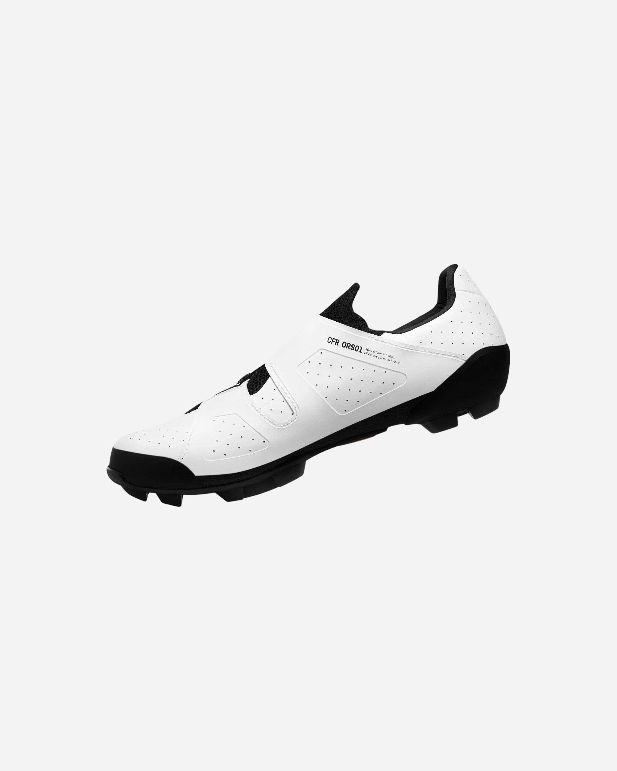 Moloko Cycling Ltd. white off-road cycling shoes with black accents and Vibram Megagrip outsole. Features perforated upper and strap closure.