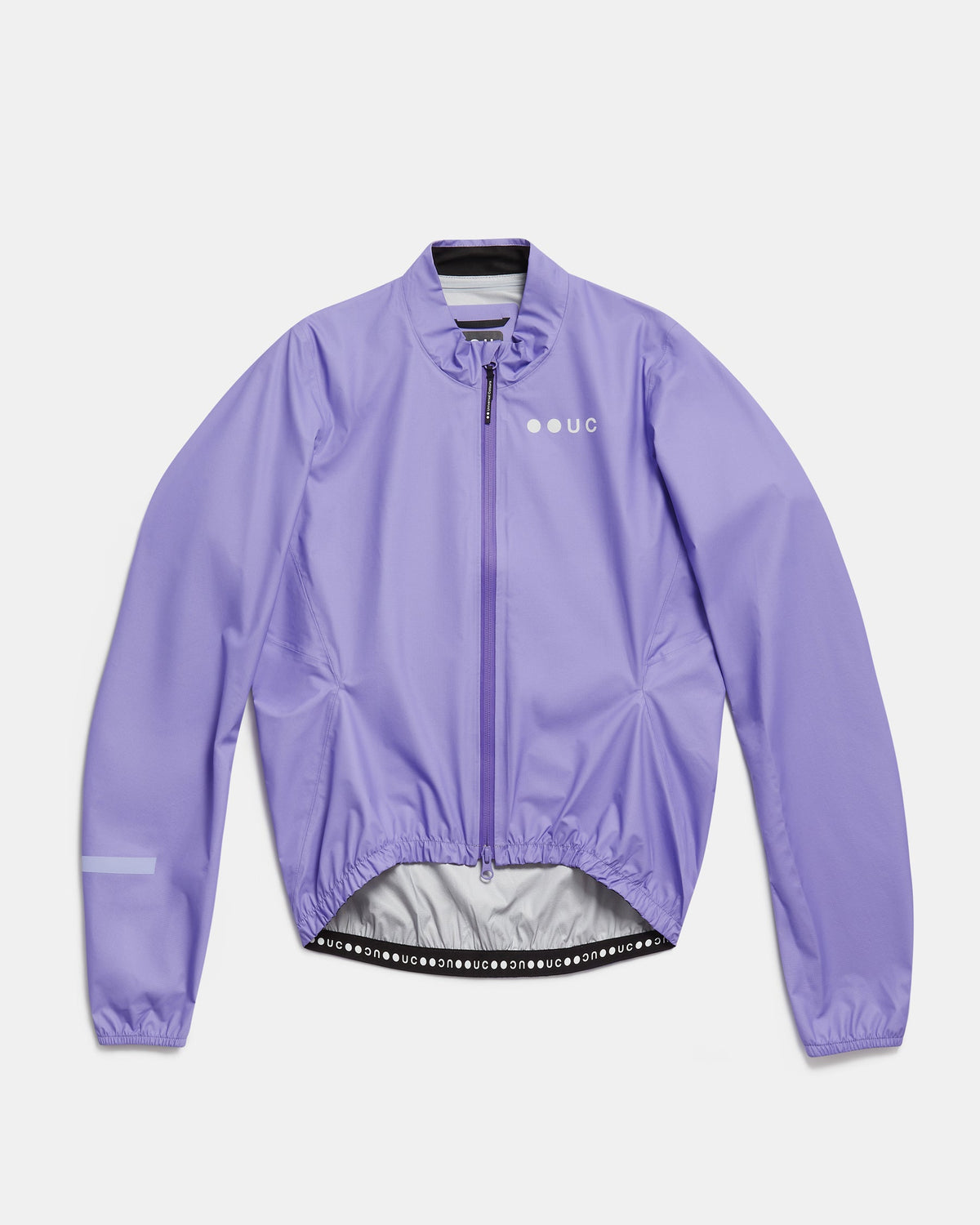 Flatlay of the Men's Mono Rain Jacket in Cloud Lilac: ripstop shell, full-length zip and UC chest logo.