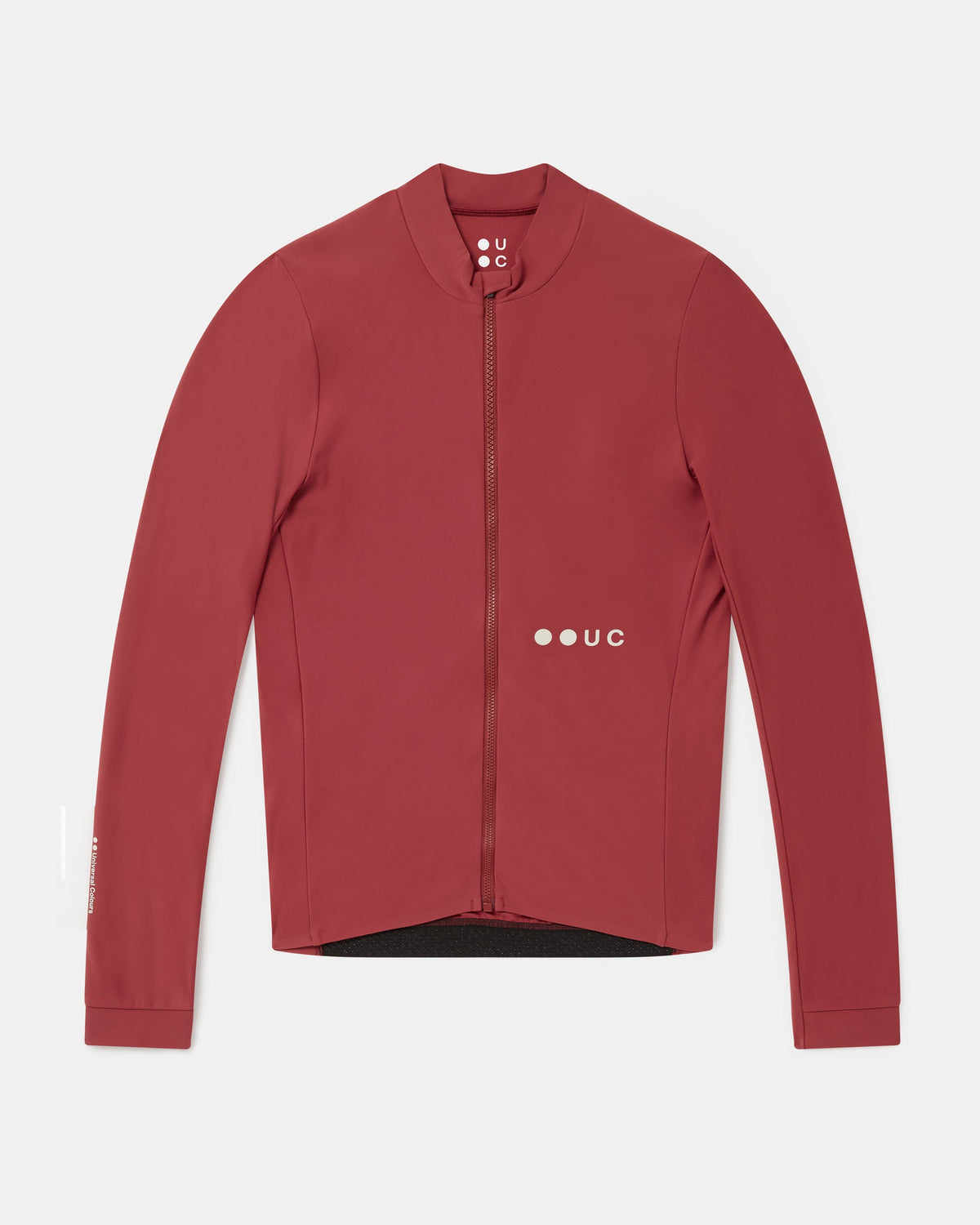Flatlay of the Men's Mono Long Sleeve Jersey in Apple Red: mock collar, full-length zip and UC logo.