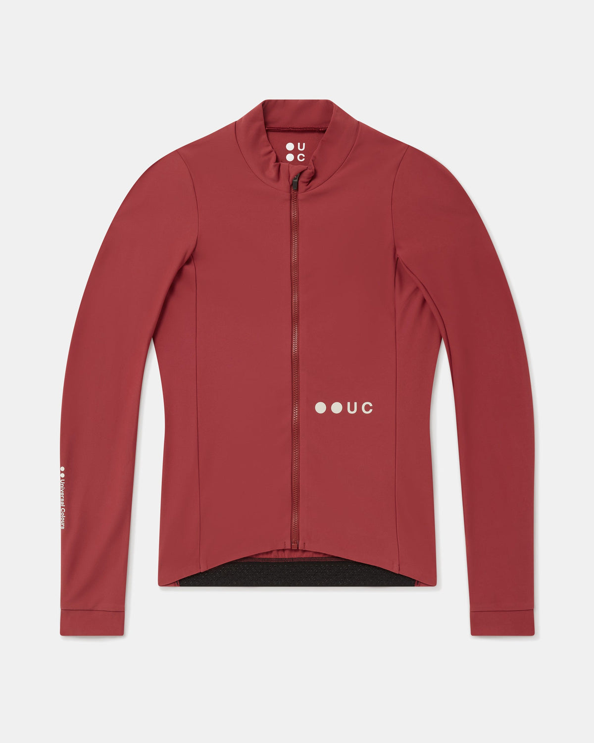 Flatlay of the Women's Mono Long Sleeve Jersey in Apple Red: full-length front zip, high collar and UC logo.