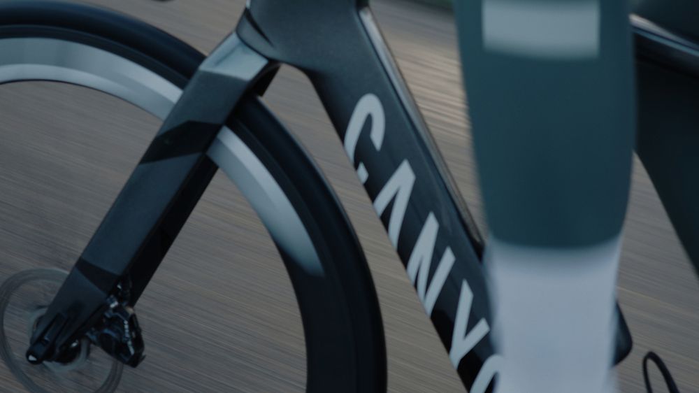 A Canyon road bike blurred with speed