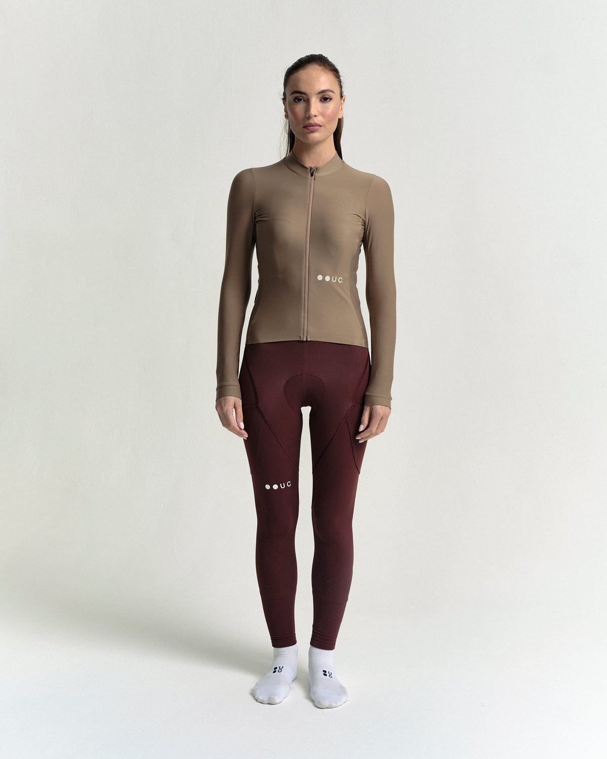 Model wearing the Women's Mono Long Sleeve Jersey in Walnut Brown.