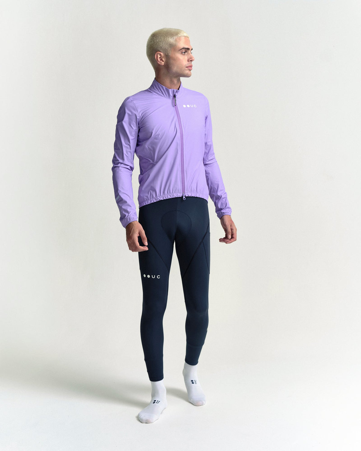 Model wearing the Men's Mono Rain Jacket in Cloud Lilac.