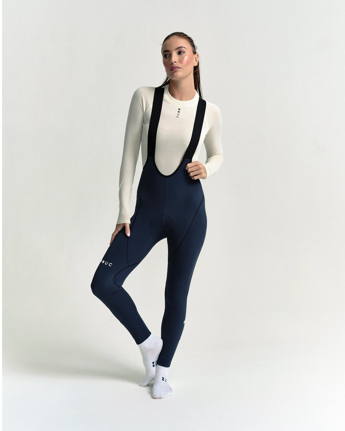 Model in the Women's Thermal Base Layer in Off White, full-length view.