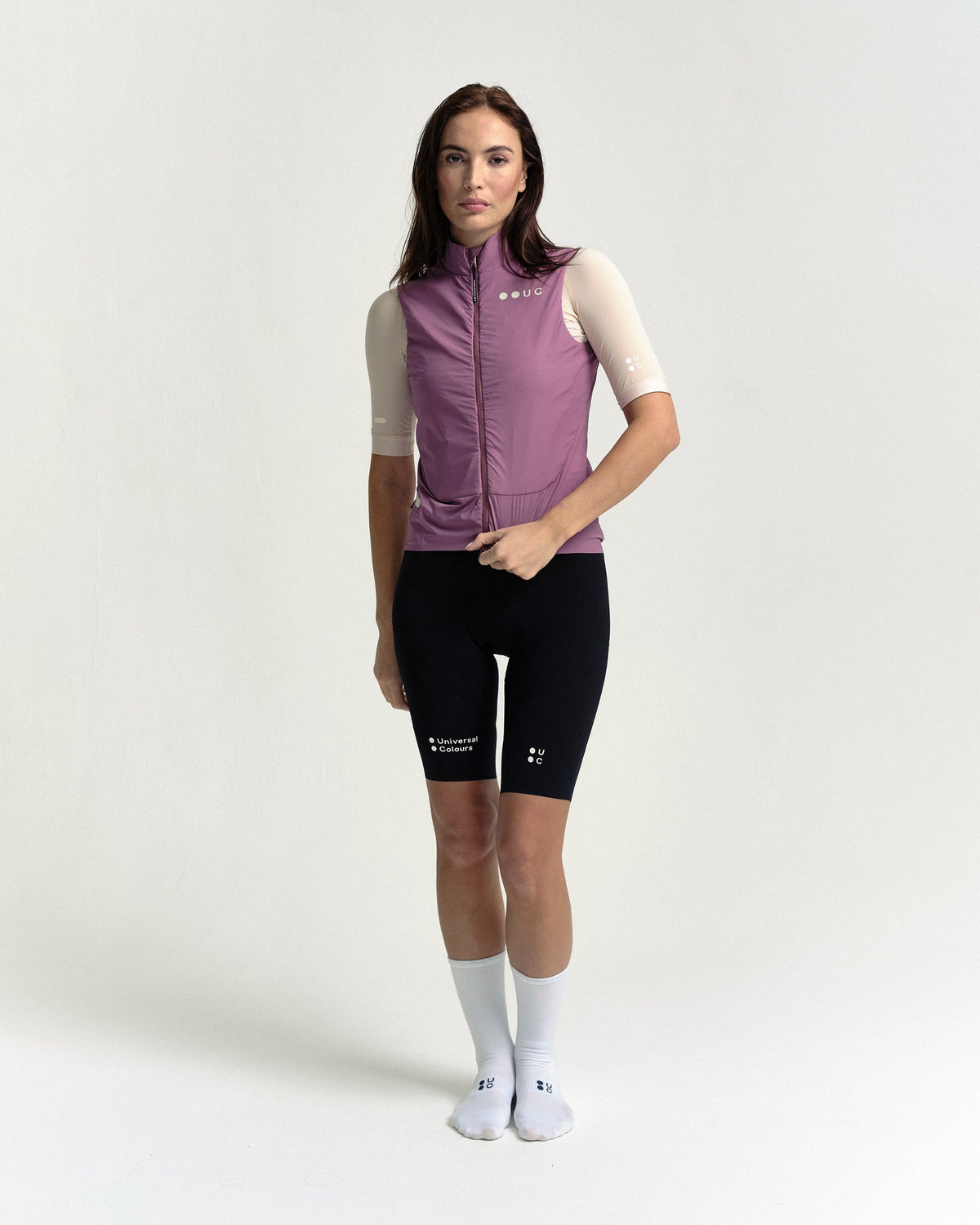 Model in the Women's Chroma Insulated Gilet in Dusty Rose, full-length view.