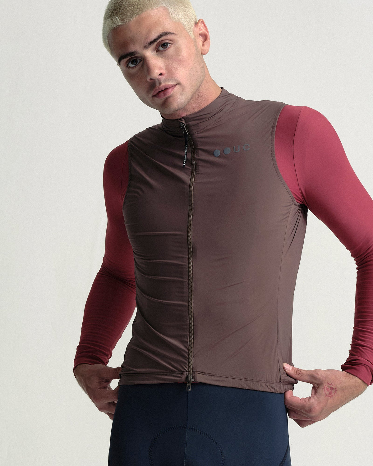 Model wearing the Men's Mono Gilet 2.0 in Stone Brown.