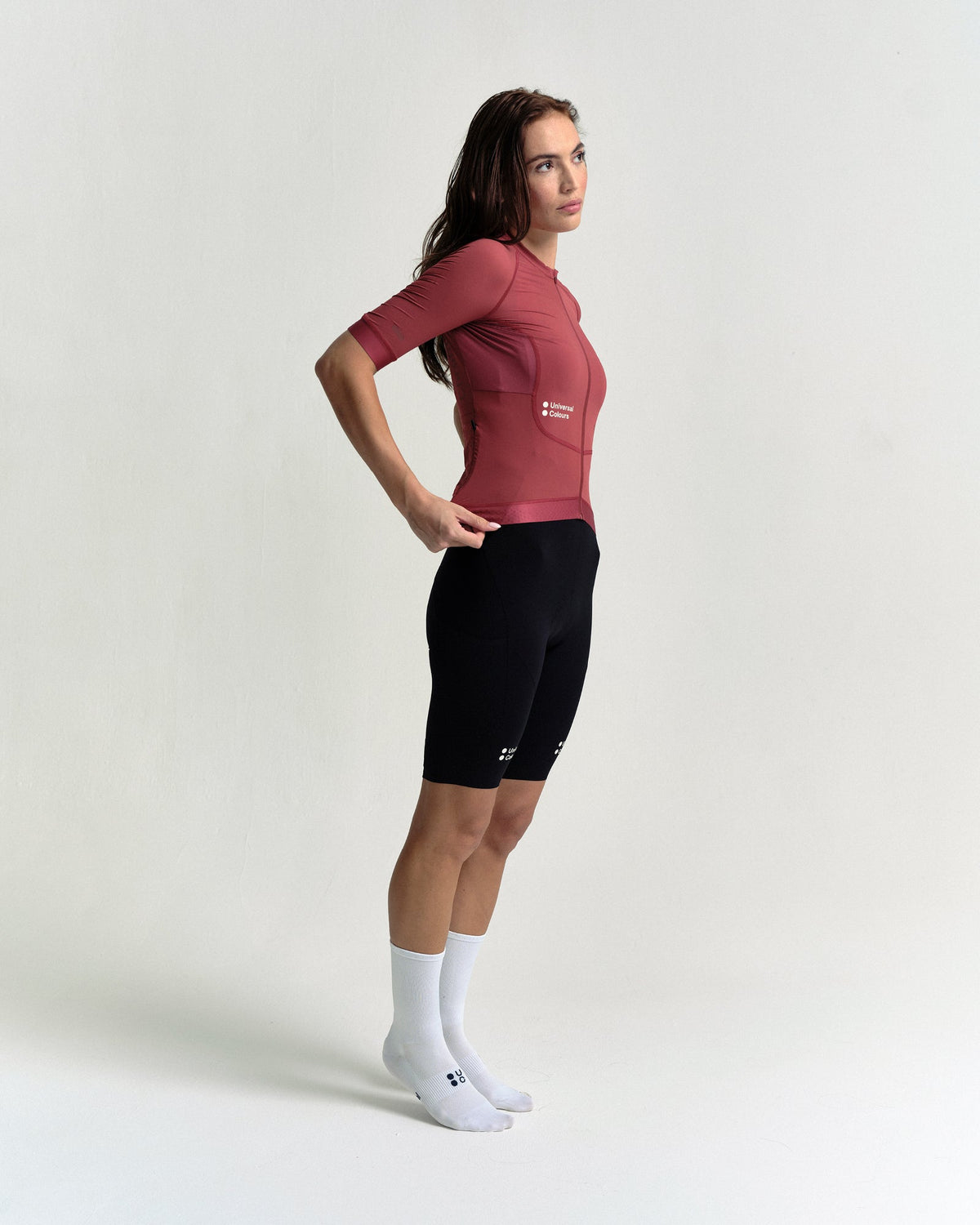 Model wearing the Women's Chroma Short Sleeve Jersey in Earth Red.
