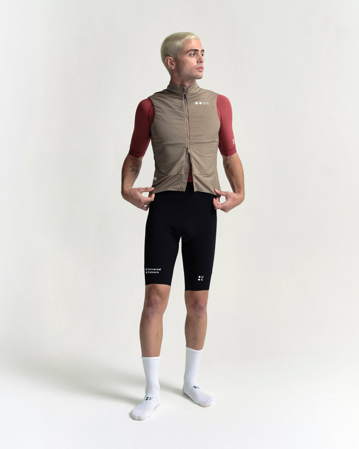 Model wearing the Men's Chroma Insulated Gilet in Walnut Brown.