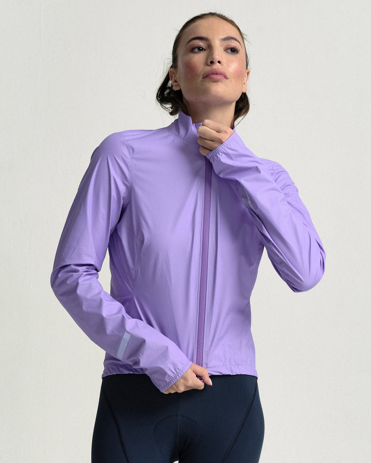 Model in the Women's Mono Rain Jacket in Cloud Lilac, close front view.