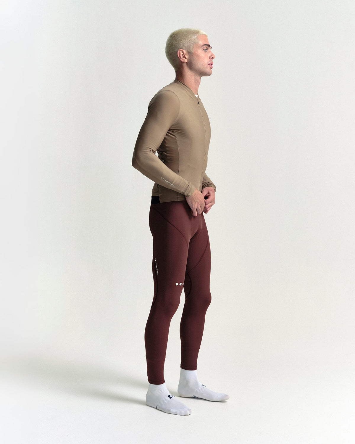 Model wearing the Men's Mono Long Sleeve Jersey in Walnut Brown.