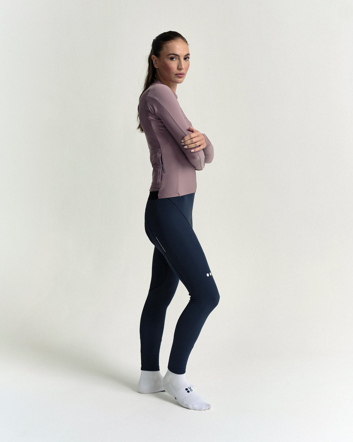 Model in the Women's Mono Long Sleeve Jersey in Mauve Mist, full-length view.