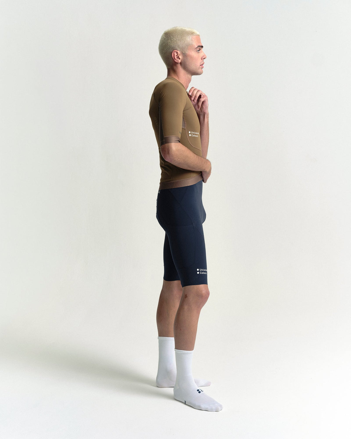 Model wearing the Men's Chroma Short Sleeve Jersey in Golden Brown.