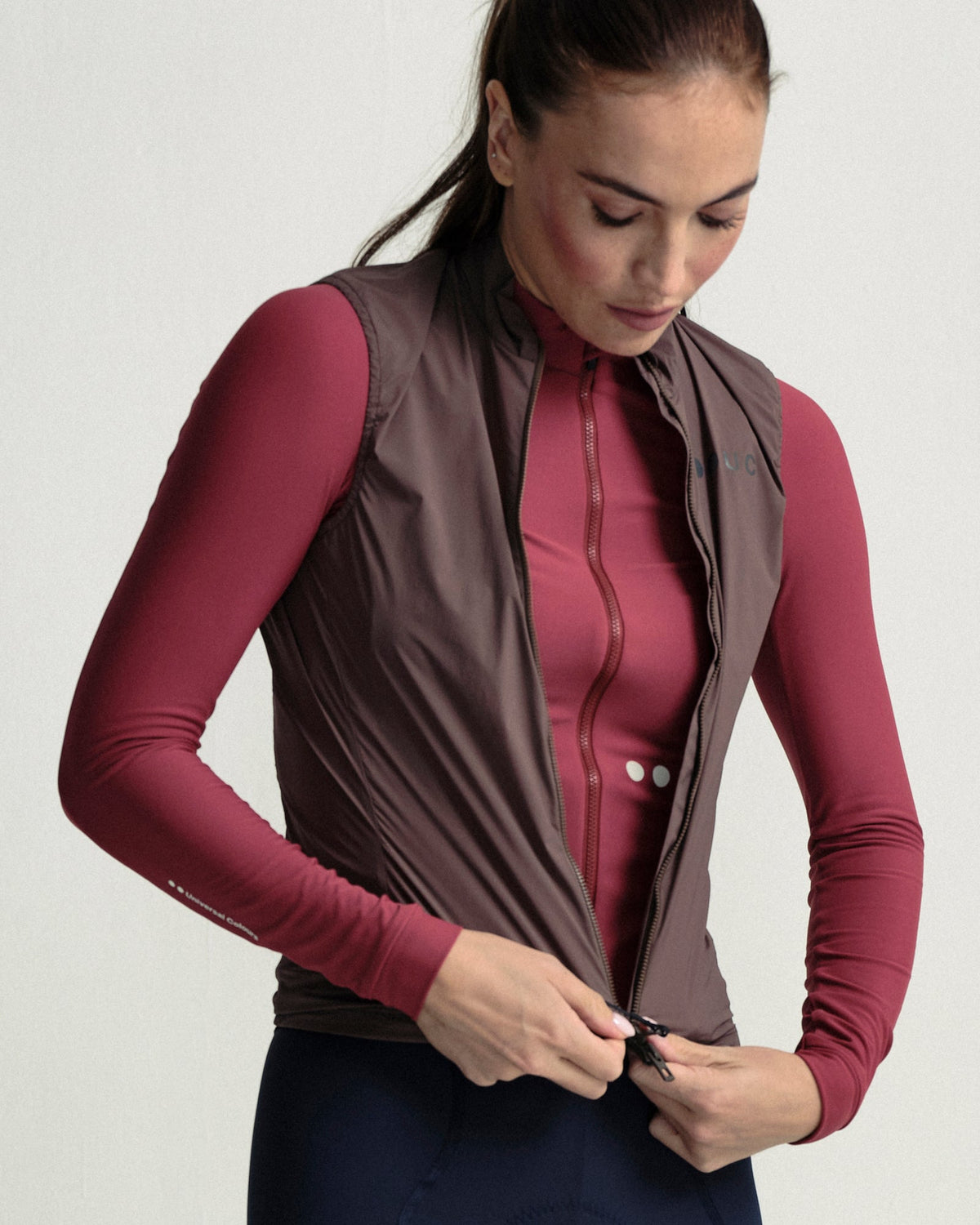 Model wearing the Women's Mono Gilet 2.0 in Stone Brown.