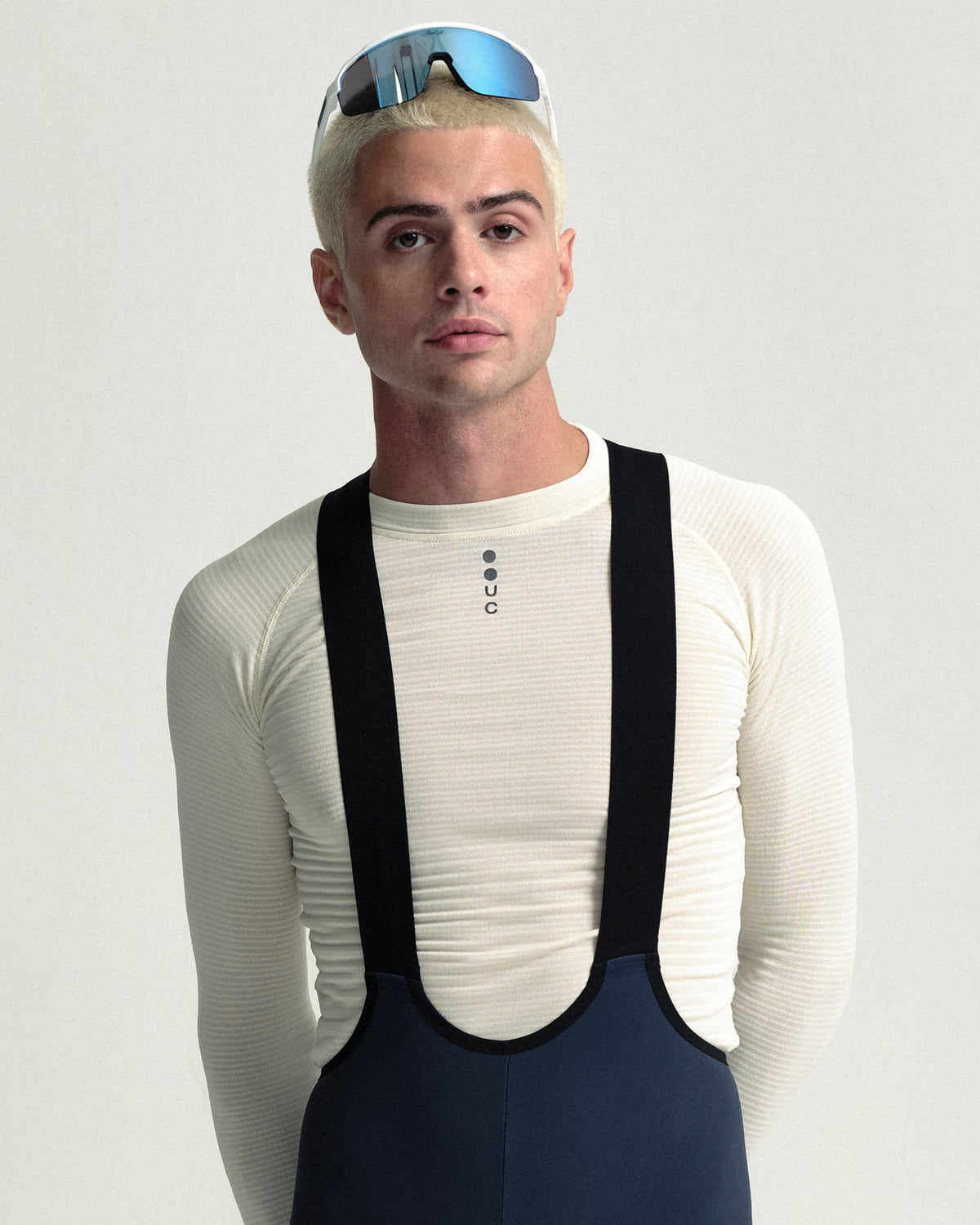 Model wearing the Men's Mono Cargo Bib Tight in Eclipse Navy.