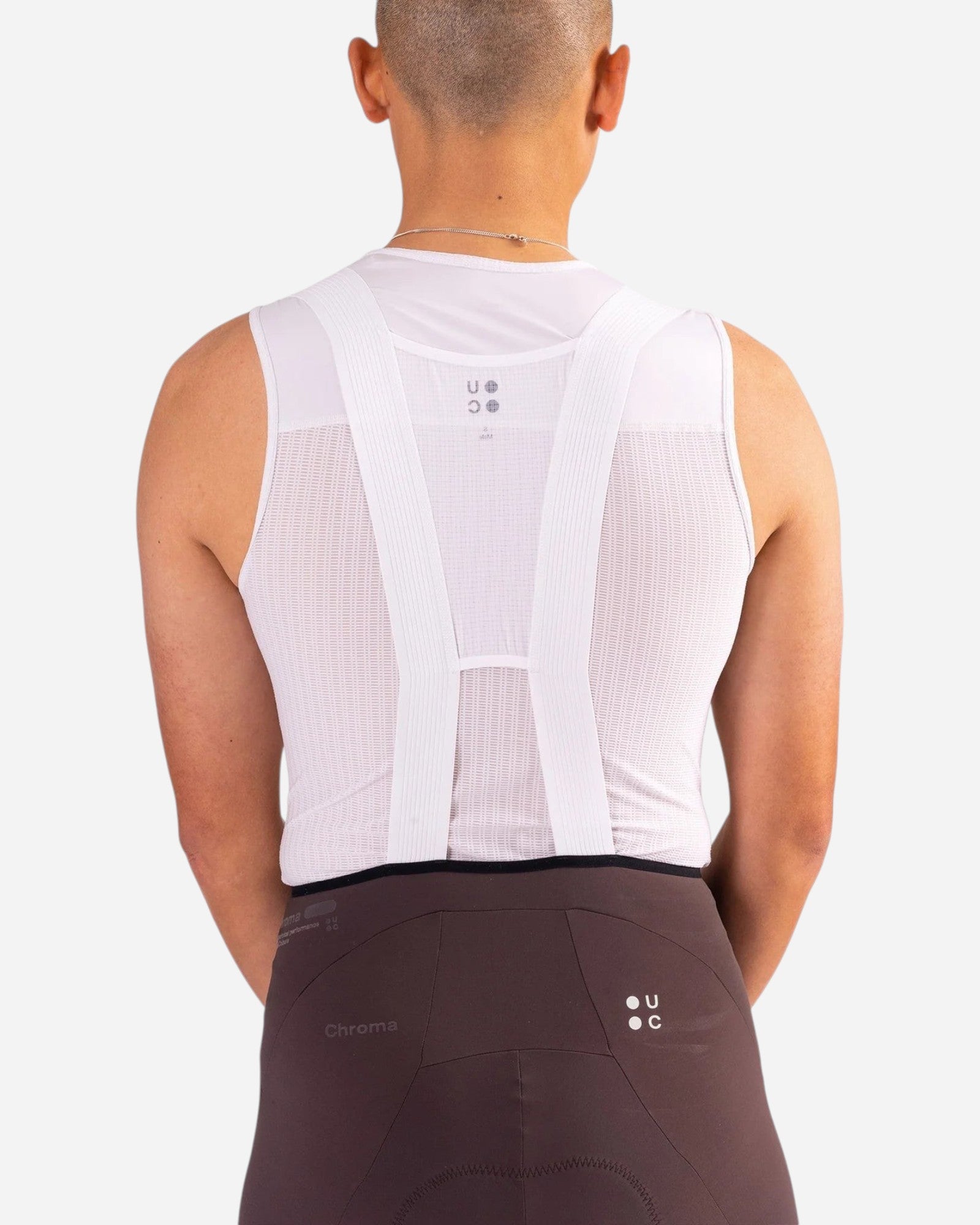 Moloko Cycling Ltd. Men's Chroma bib shorts in heavy dark brown, made from premium French nylon with white straps and a black waistband.