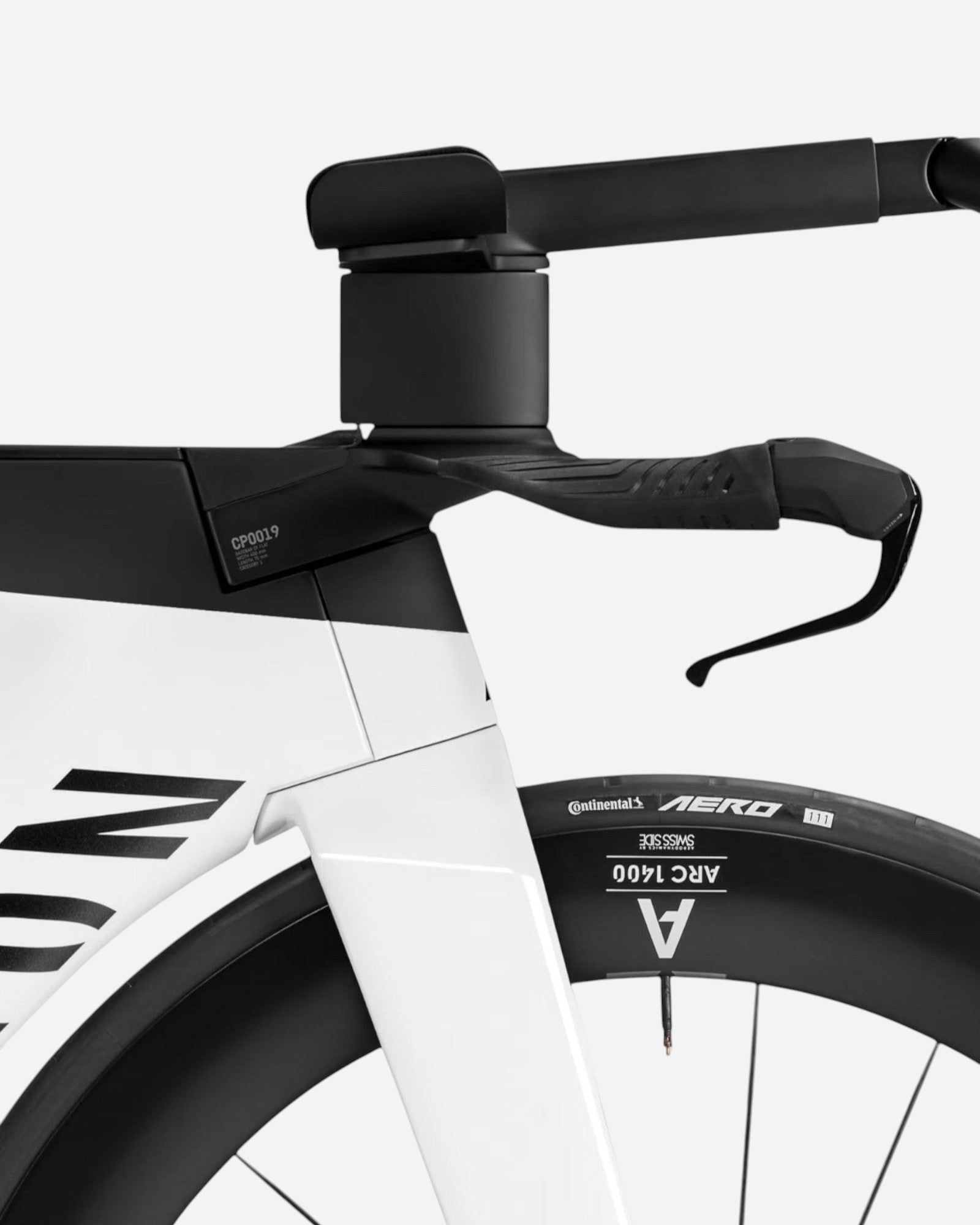 Moloko Cycling Ltd. Speedmax CF SLX 8 Ultegra Di2 triathlon bike, white and black aero frame, integrated handlebars, and carbon wheel.