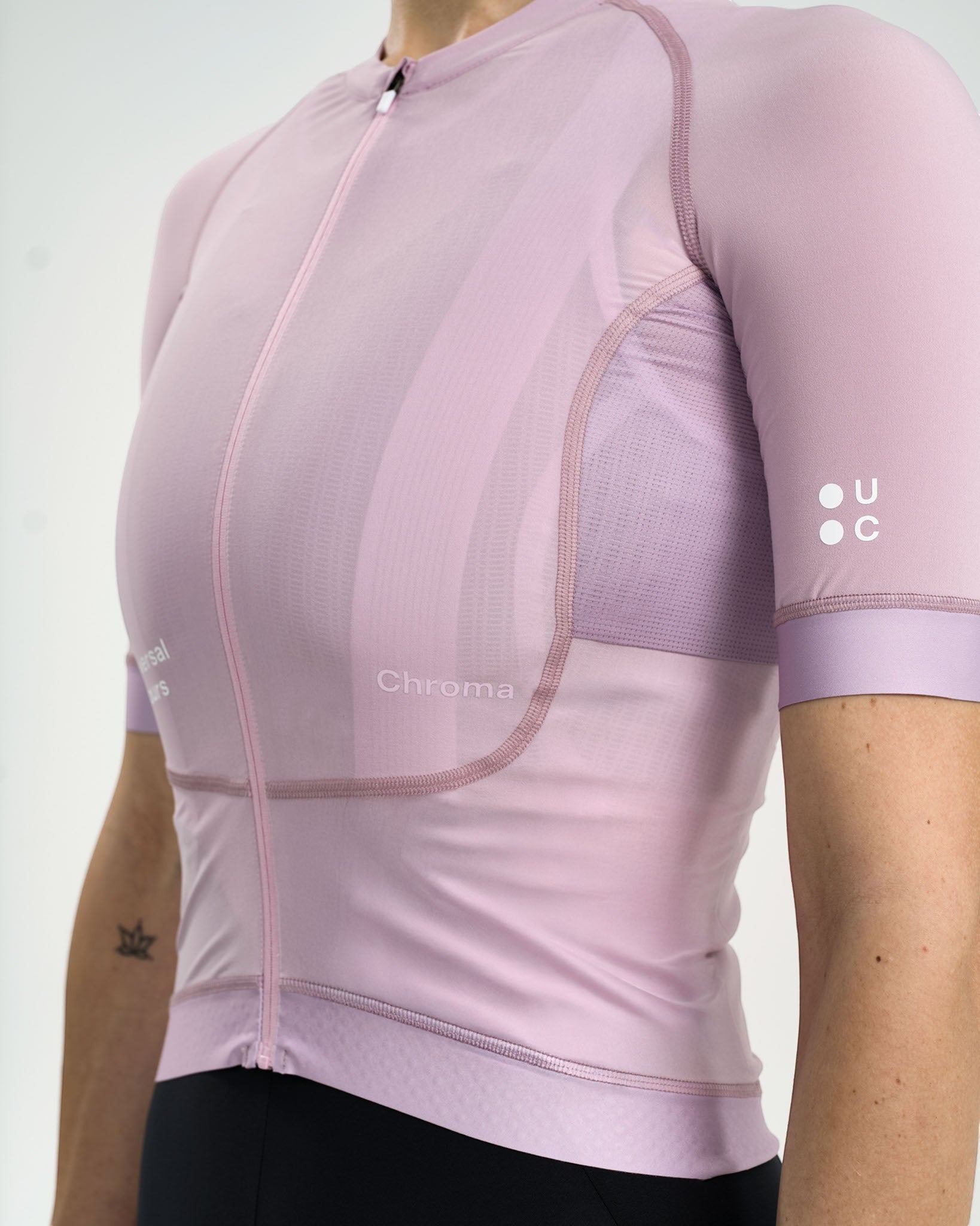 Moloko Cycling Ltd. women's short sleeve cycling jersey in washed lilac, made from recycled polyester and Italian woven fabric with a tailored fit and three rear pockets.