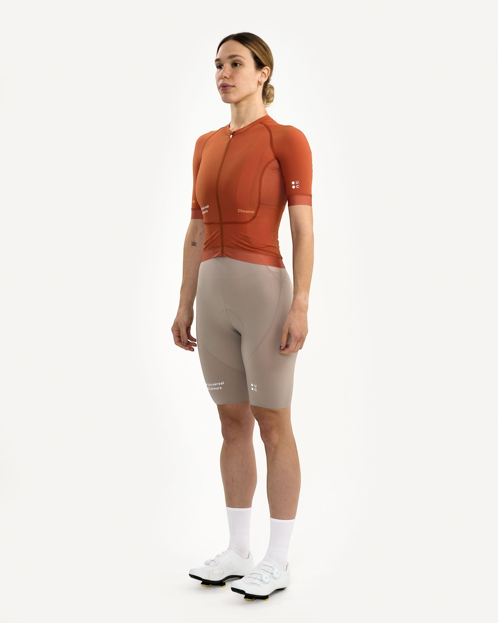 Moloko Cycling Ltd. women's Cyprus Copper short sleeve cycling jersey made from recycled polyester with a full zip and three rear pockets.