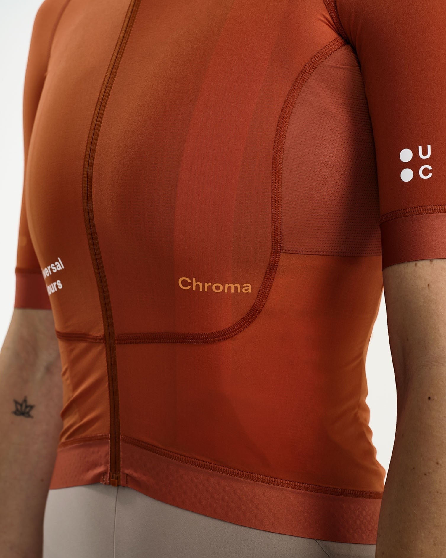 Moloko Cycling Ltd. women's short sleeve cycling jersey in Cyprus Copper. Made from recycled polyester and Italian fabric with a matte finish and three rear pockets.