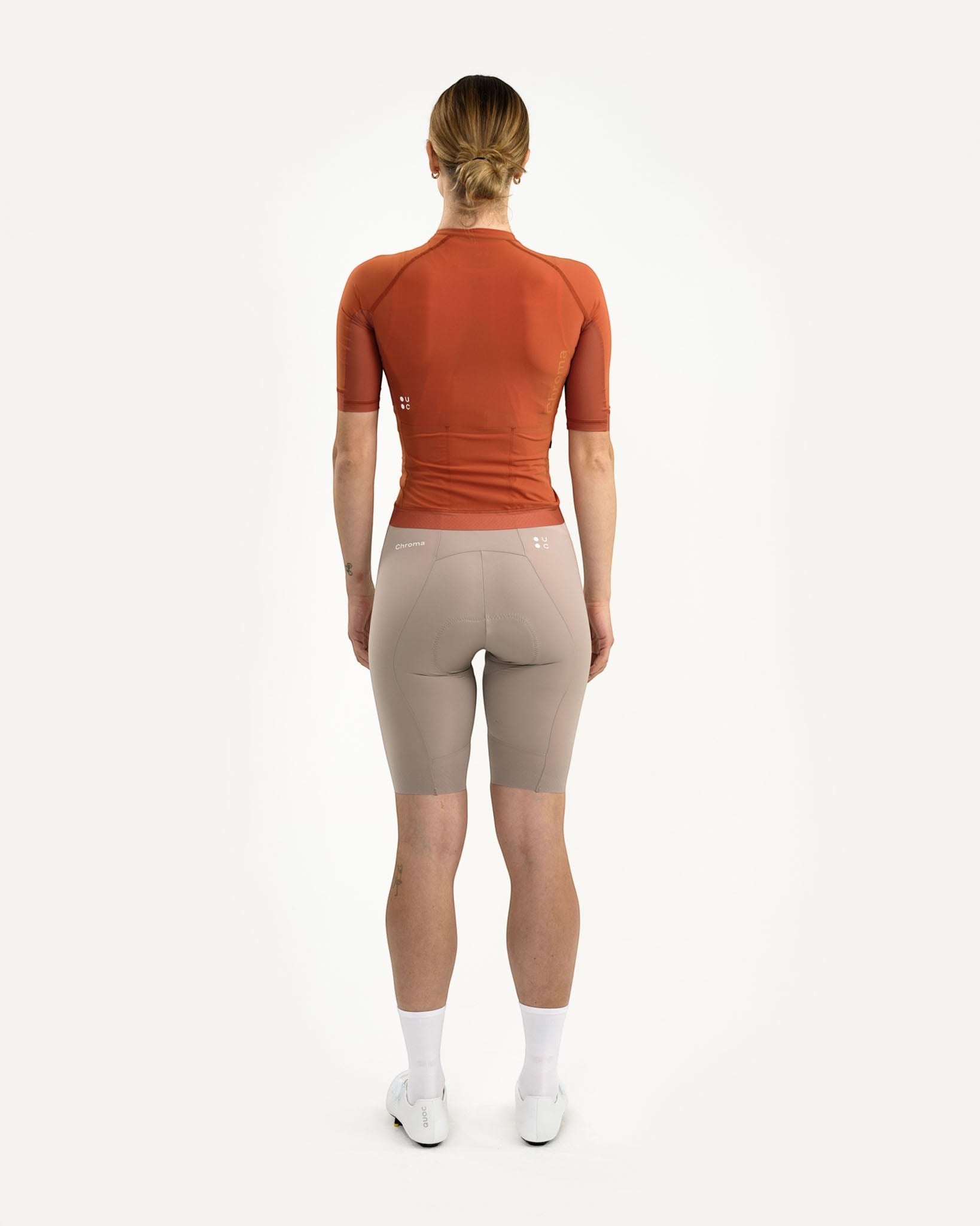 Moloko Cycling Ltd. women's Cyprus Copper short sleeve cycling jersey made from recycled polyester with three rear pockets.